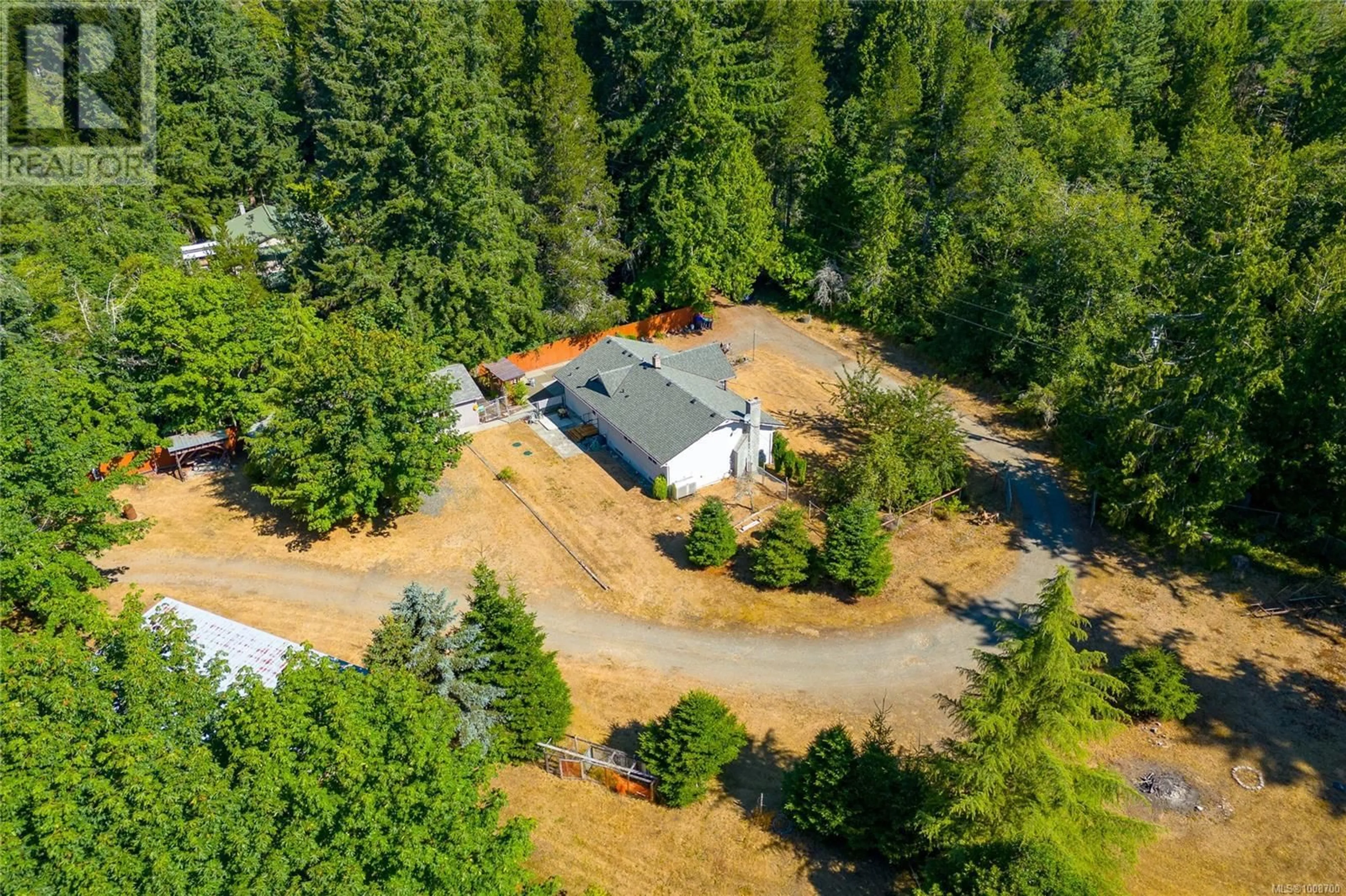 A pic from outside/outdoor area/front of a property/back of a property/a pic from drone, forest/trees view for 1080 ALLGARD ROAD, Qualicum Beach British Columbia V0R2H0