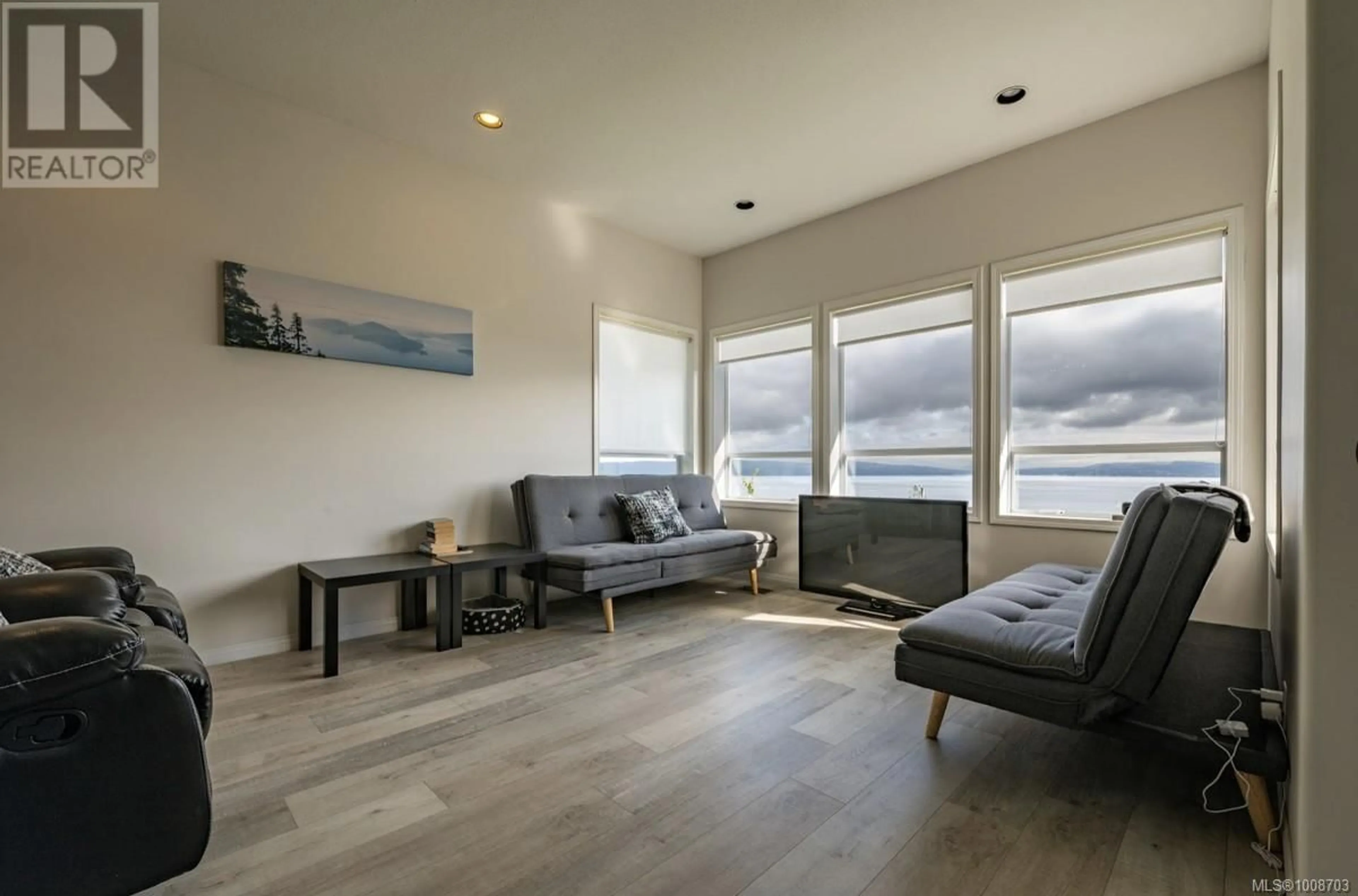 Living room with furniture, wood/laminate floor for 2543 CARDENA CRESCENT, Port McNeill British Columbia V0N2R0