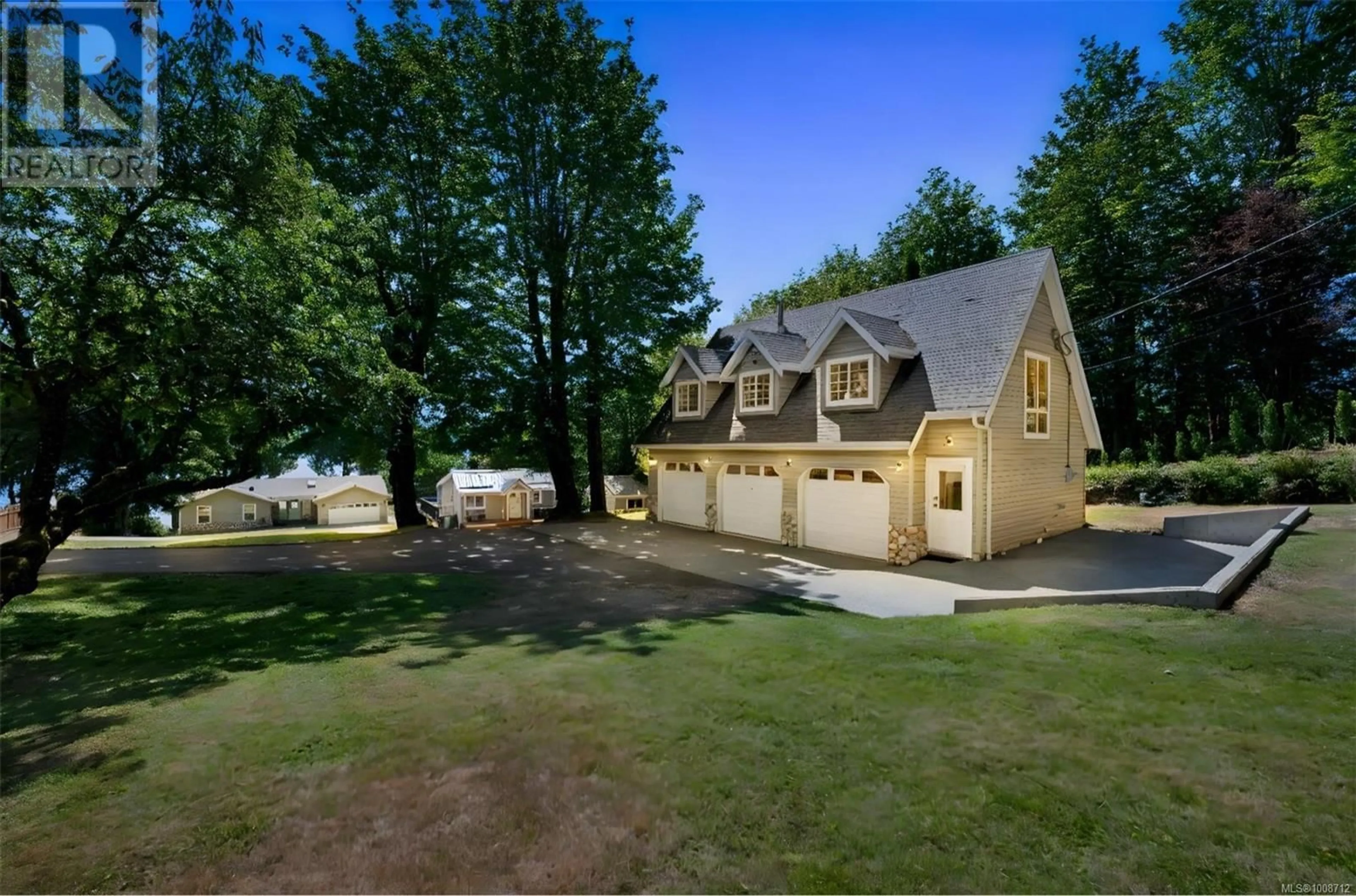 A pic from outside/outdoor area/front of a property/back of a property/a pic from drone, street for 10182 YOUBOU ROAD, Youbou British Columbia V0R3E1