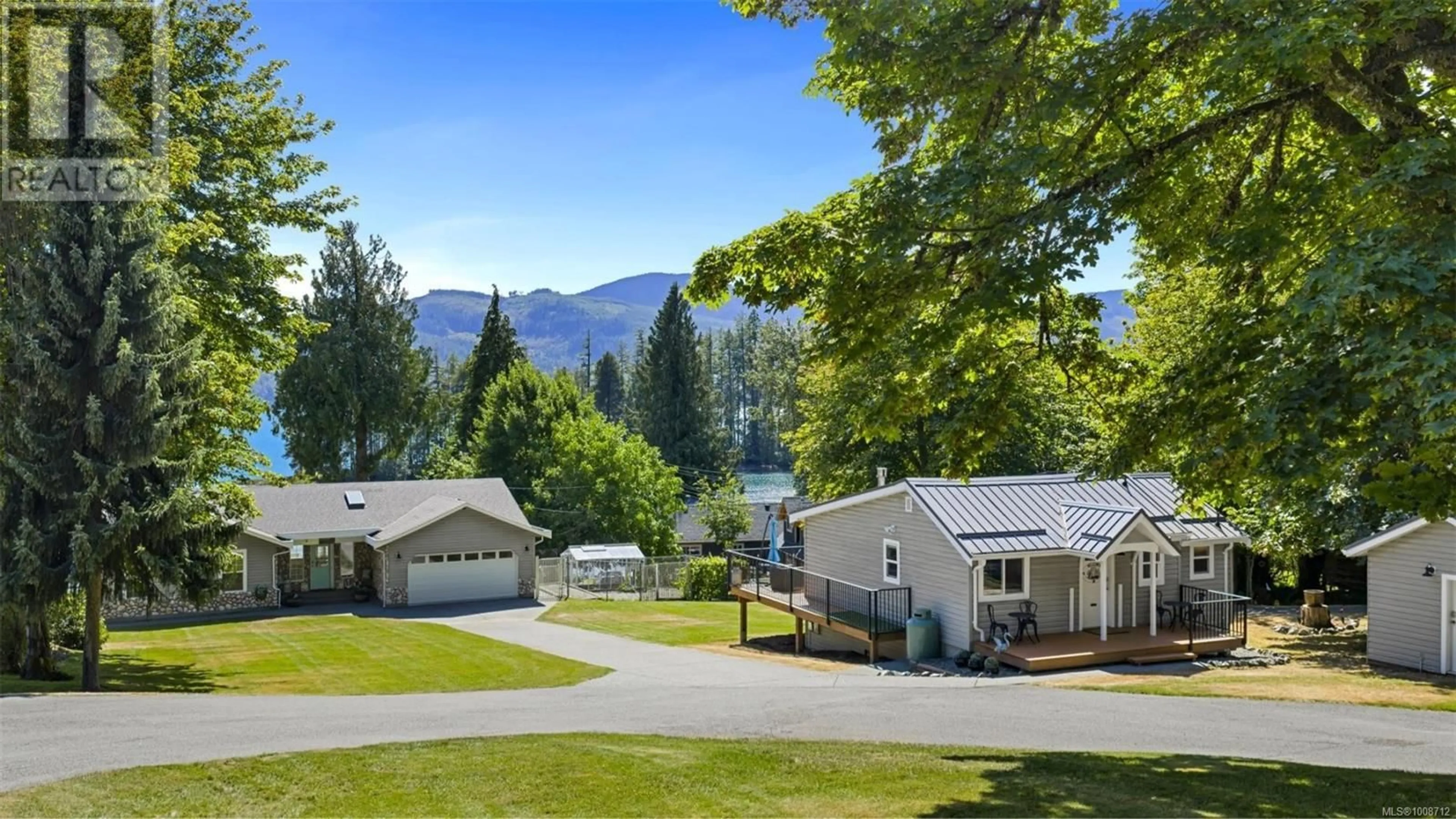 A pic from outside/outdoor area/front of a property/back of a property/a pic from drone, mountain view for 10182 YOUBOU ROAD, Youbou British Columbia V0R3E1