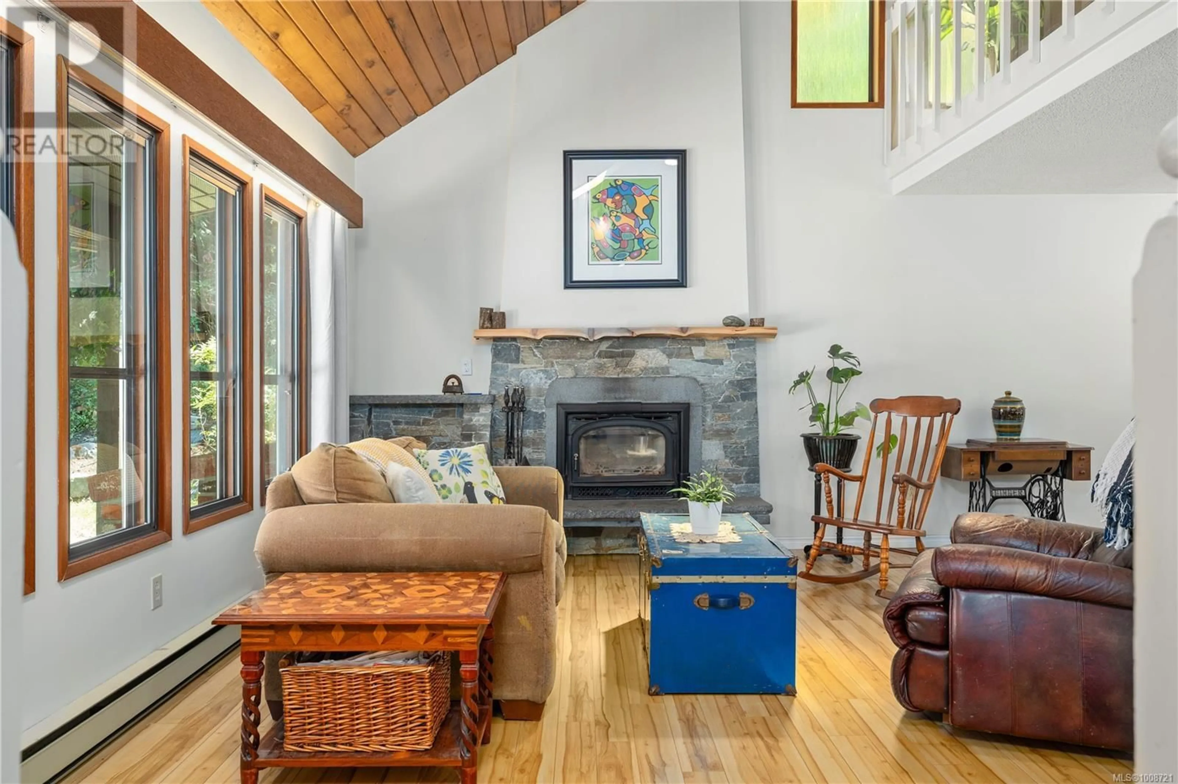 Living room with furniture, unknown for 7163 SEBASTION ROAD, Lantzville British Columbia V0R2H0