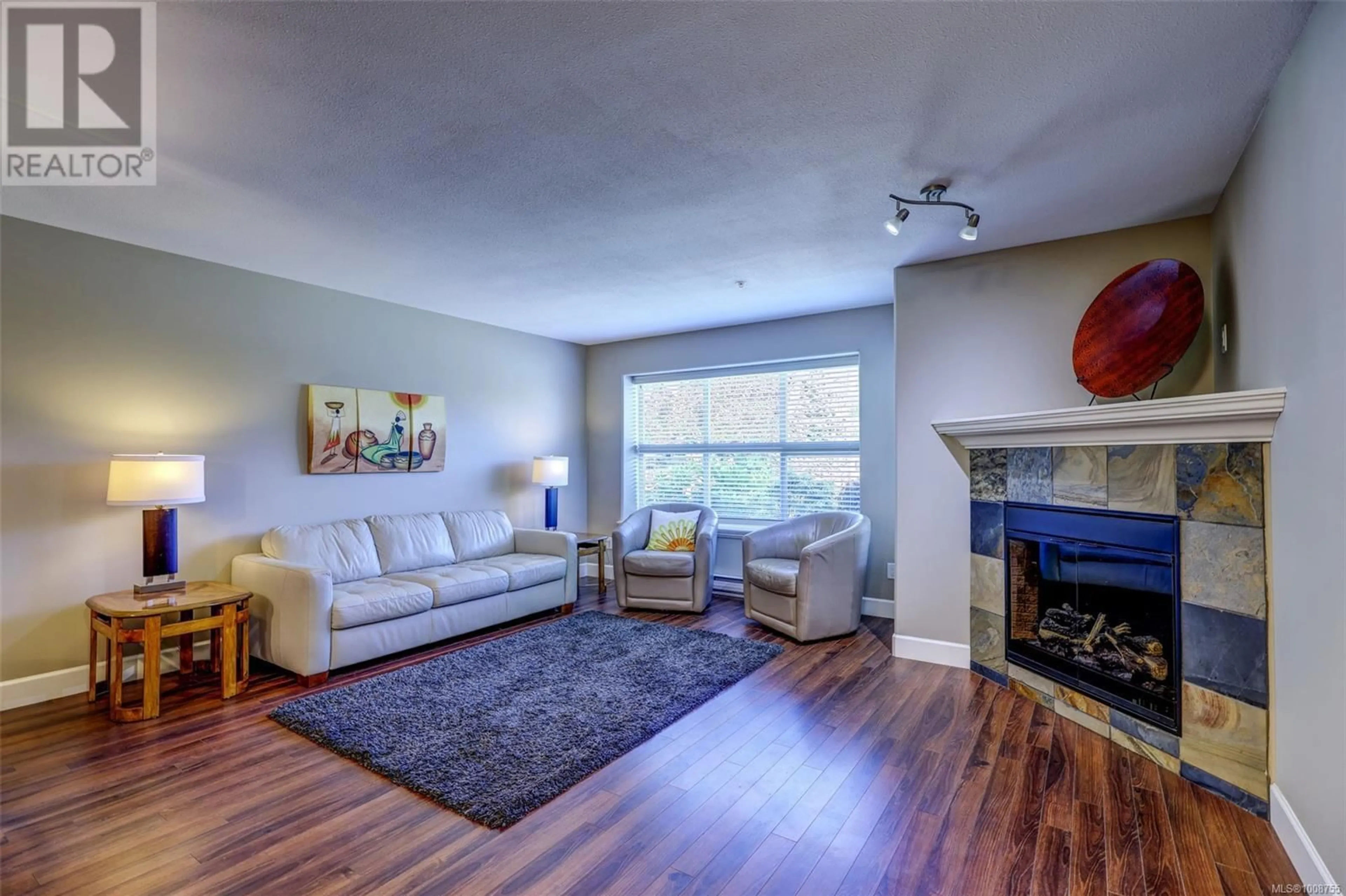 Living room with furniture, unknown for 101 - 5945 KADEN PLACE, Nanaimo British Columbia V9T0B5