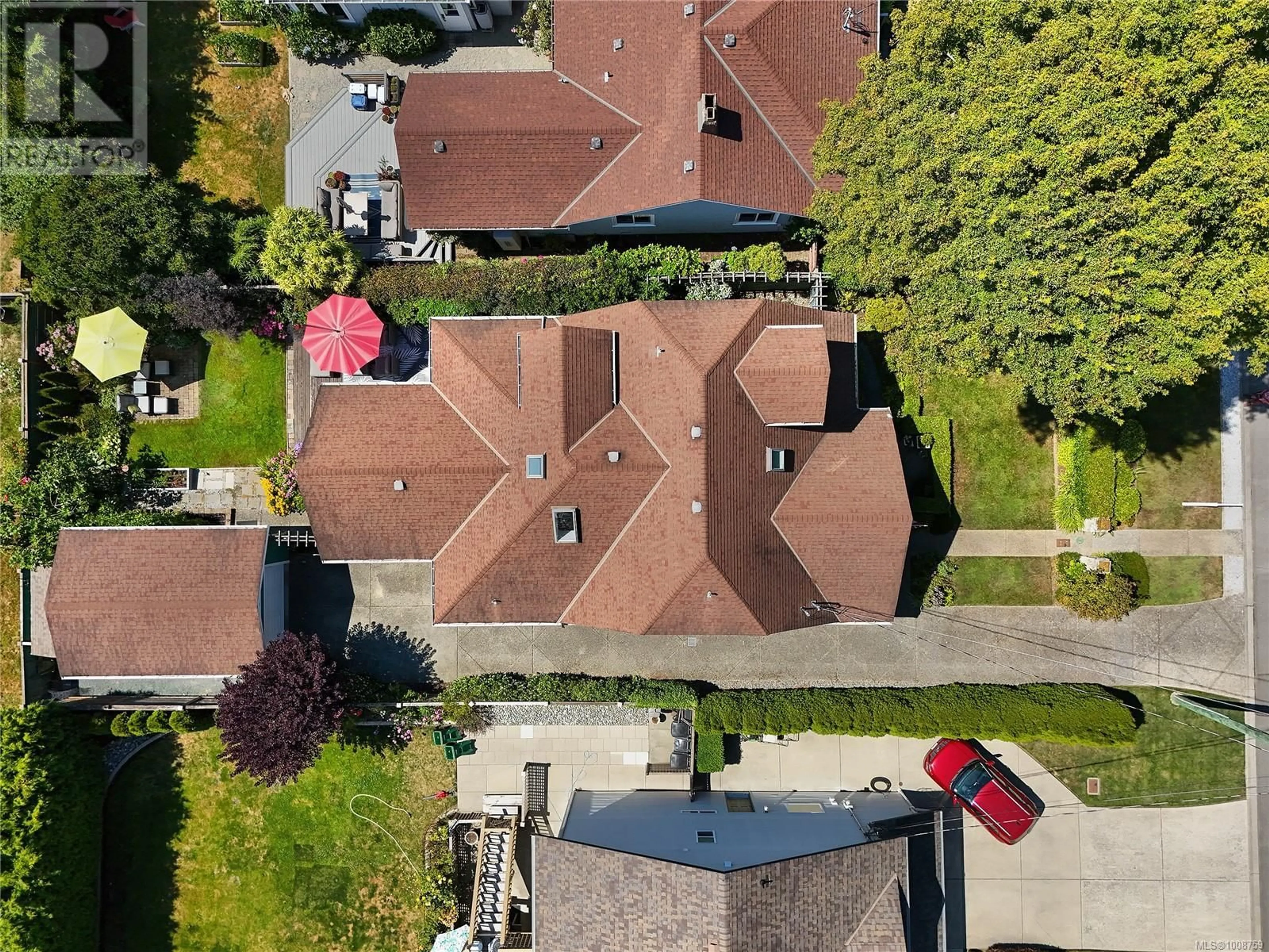 A pic from outside/outdoor area/front of a property/back of a property/a pic from drone, street for 1875 NEIL STREET, Saanich British Columbia V8R3C6