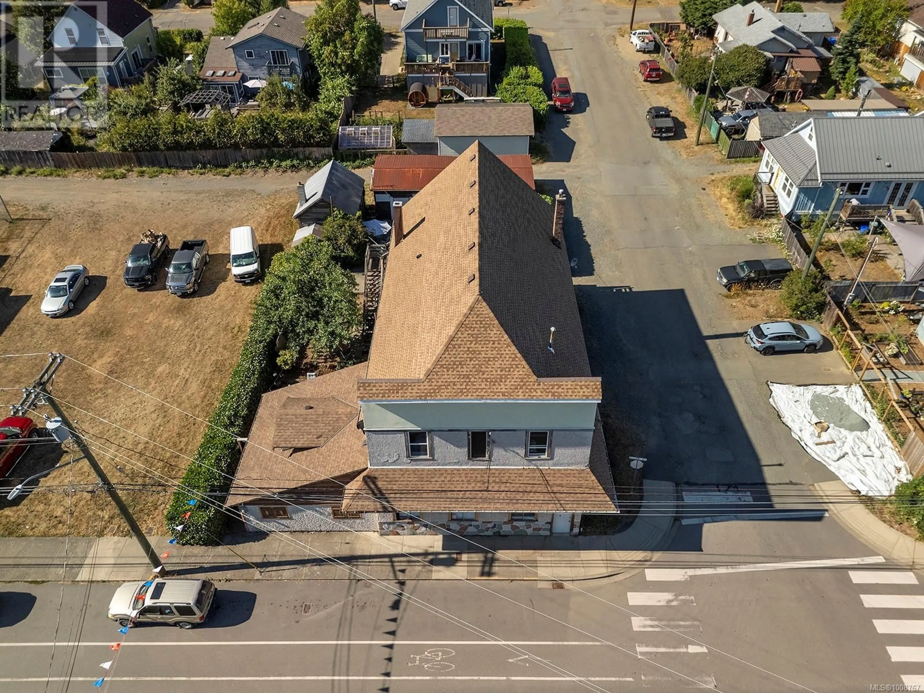A pic from outside/outdoor area/front of a property/back of a property/a pic from drone, street for 2780 DUNSMUIR AVENUE, Cumberland British Columbia V0R1S0