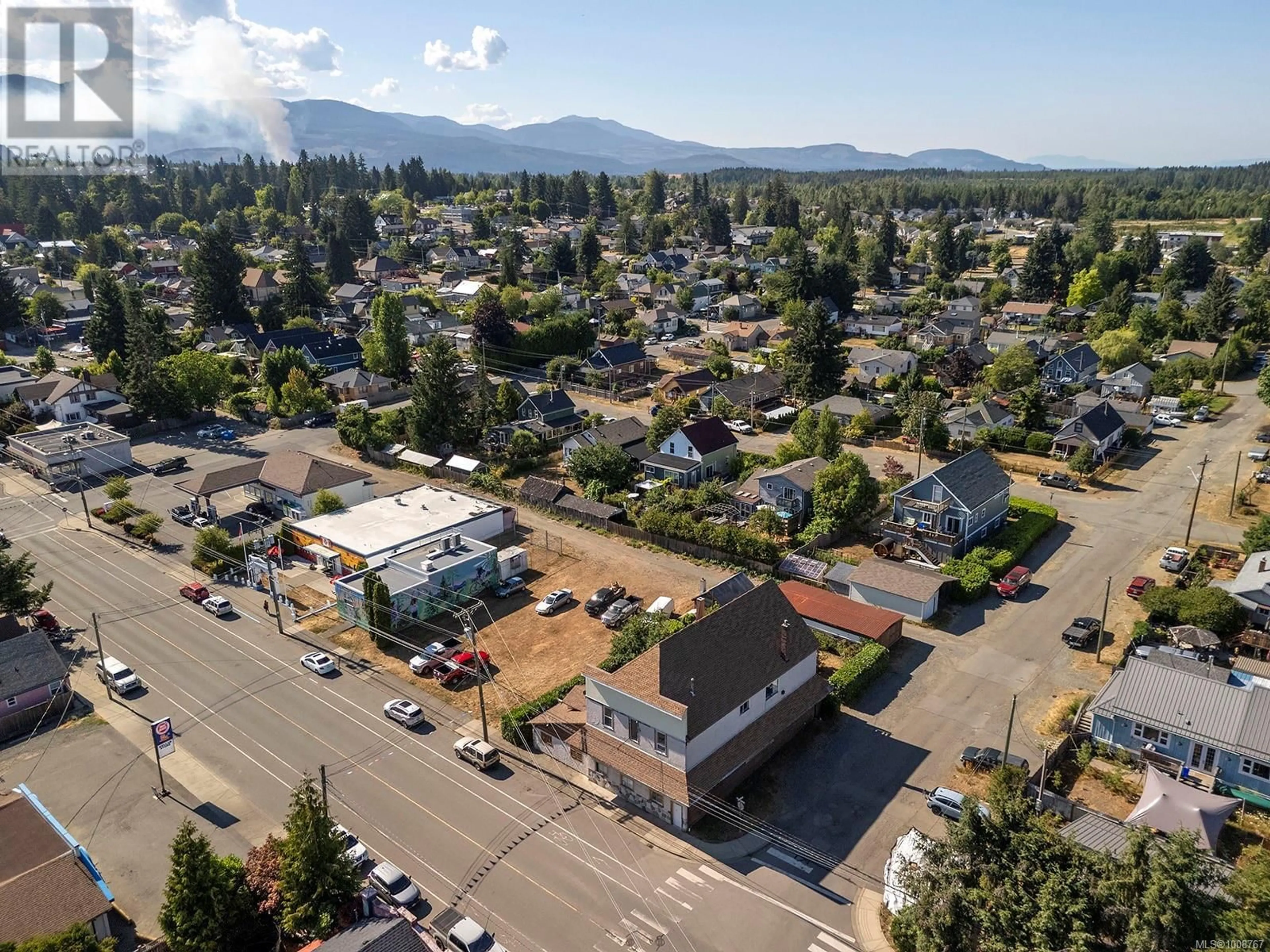 A pic from outside/outdoor area/front of a property/back of a property/a pic from drone, mountain view for 2780 DUNSMUIR AVENUE, Cumberland British Columbia V0R1S0