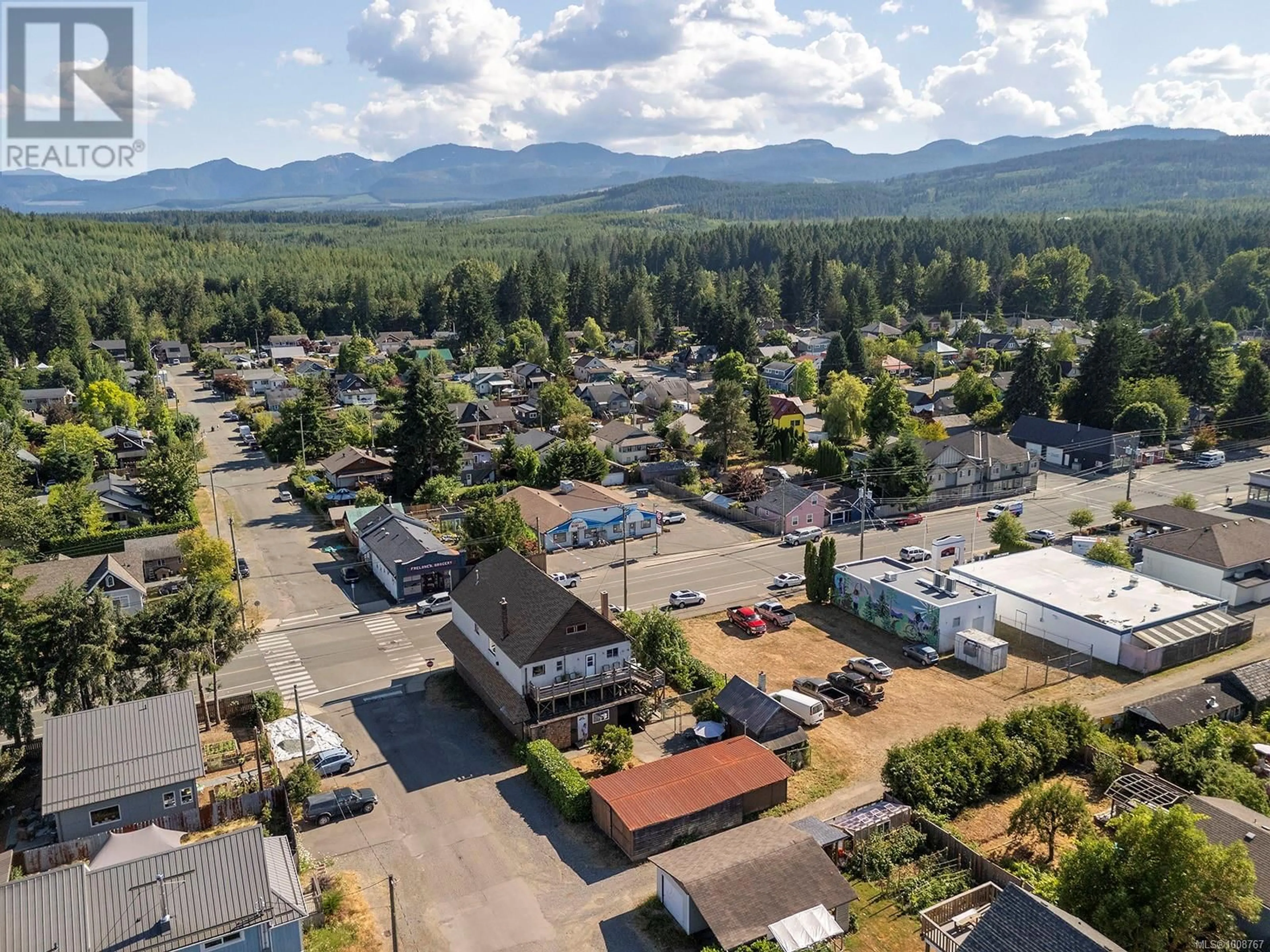 A pic from outside/outdoor area/front of a property/back of a property/a pic from drone, mountain view for 2780 DUNSMUIR AVENUE, Cumberland British Columbia V0R1S0