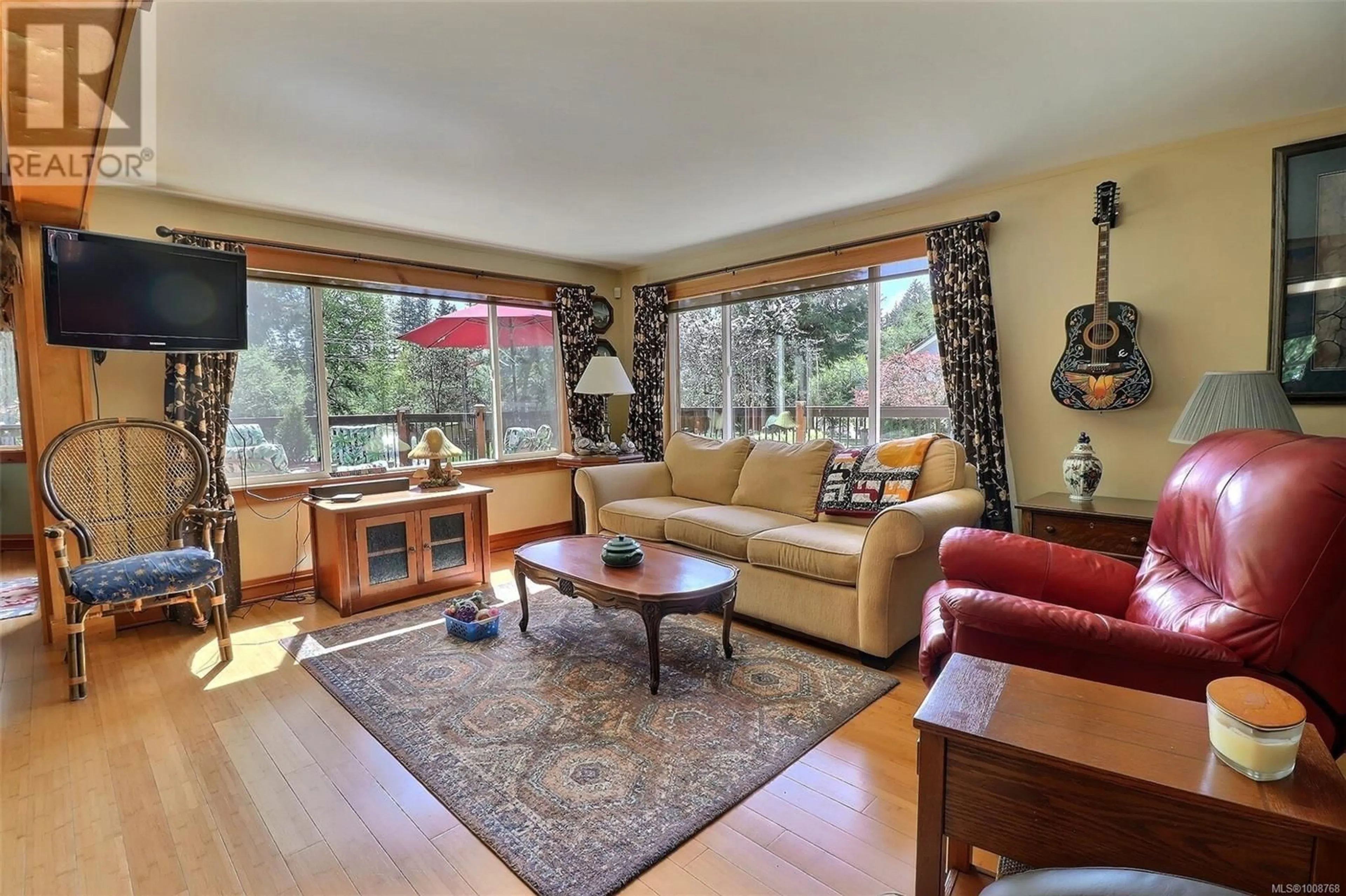 Living room with furniture, unknown for 2220 SALMON POINT ROAD, Campbell River British Columbia V9H1E6
