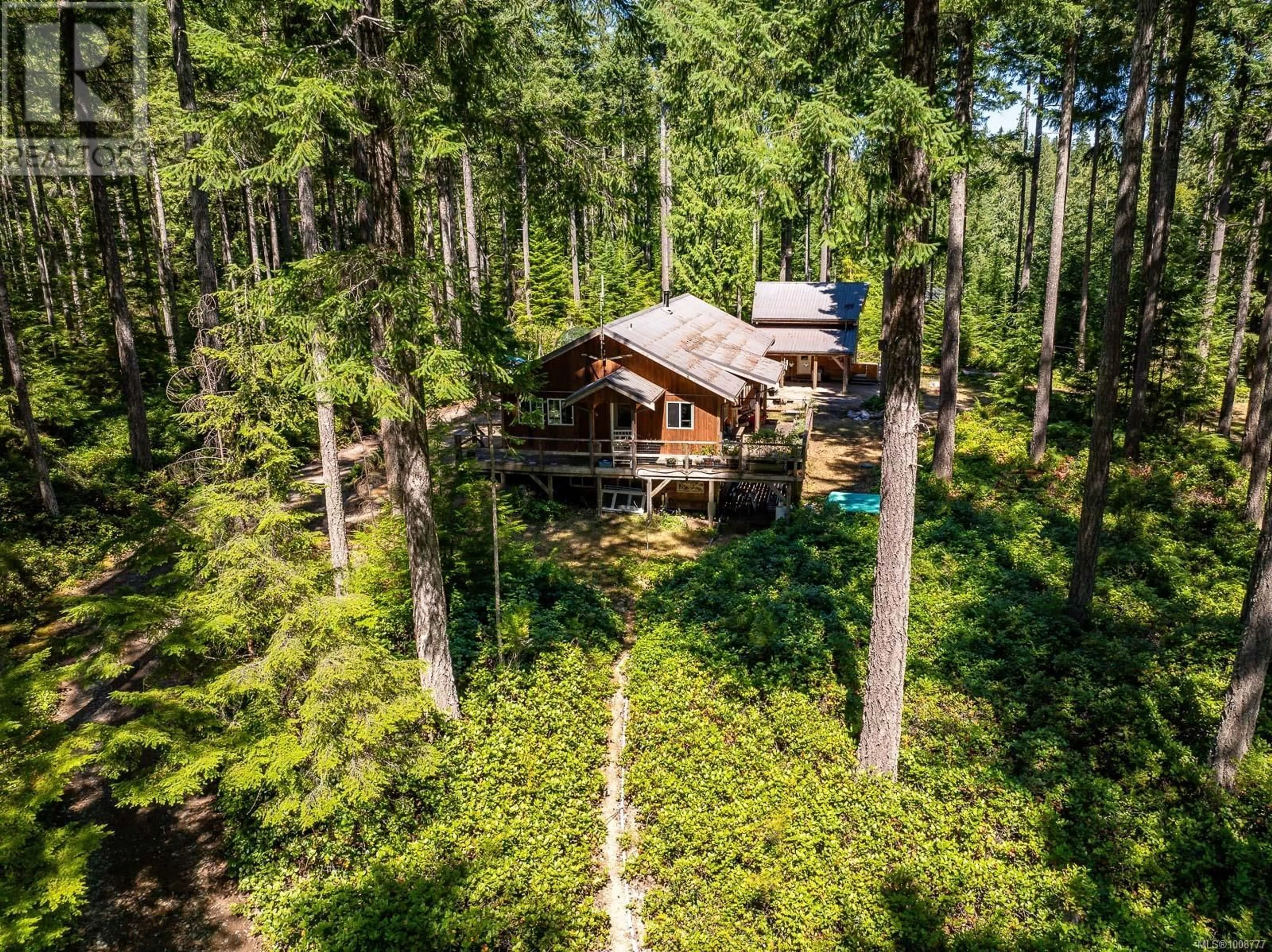 A pic from outside/outdoor area/front of a property/back of a property/a pic from drone, forest/trees view for 924 SISKIN LANE, Cortes Island British Columbia V0P1K0