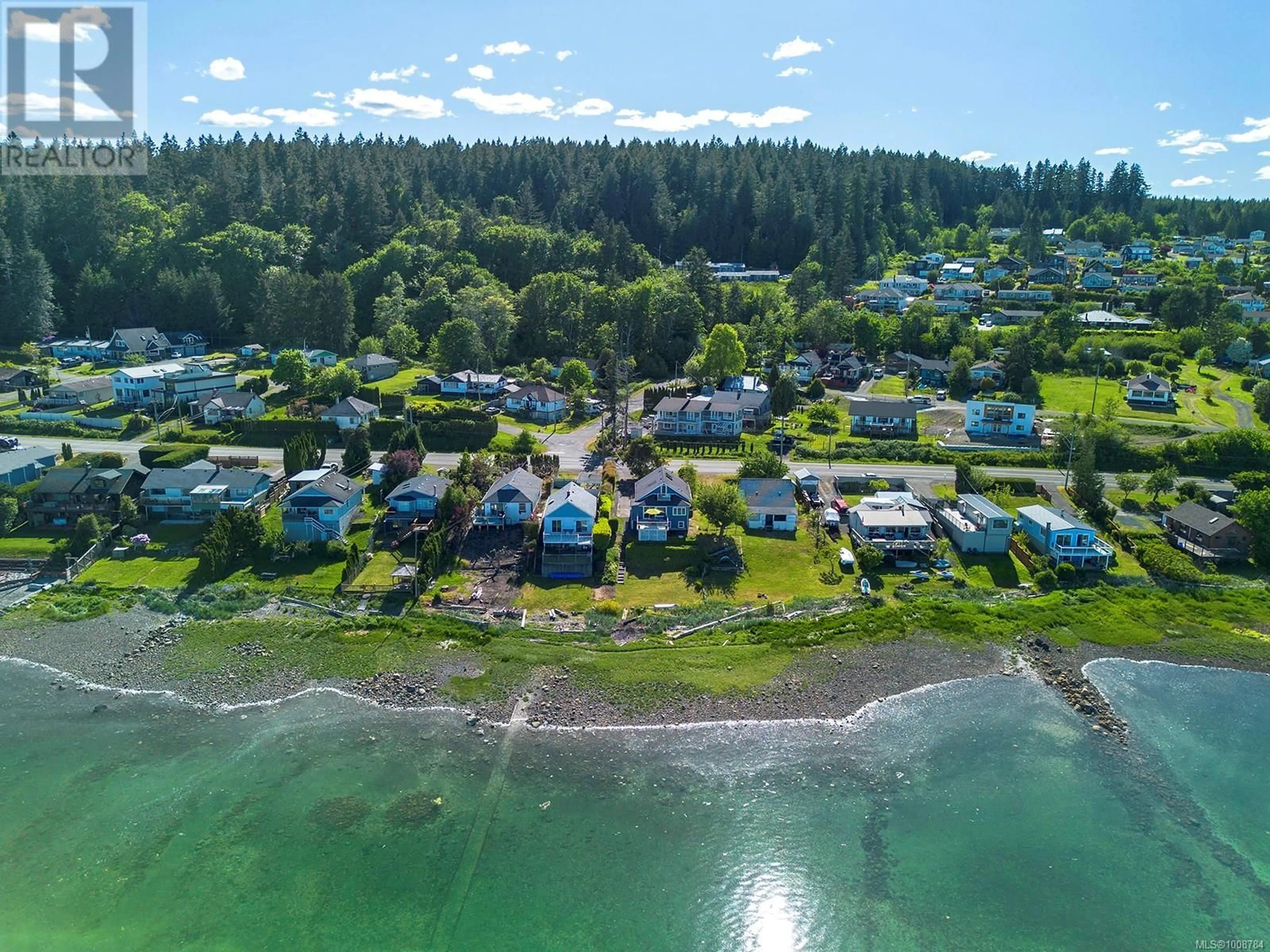 A pic from outside/outdoor area/front of a property/back of a property/a pic from drone, water/lake/river/ocean view for 5632 ISLAND HIGHWAY SOUTH, Union Bay British Columbia V0R1S0