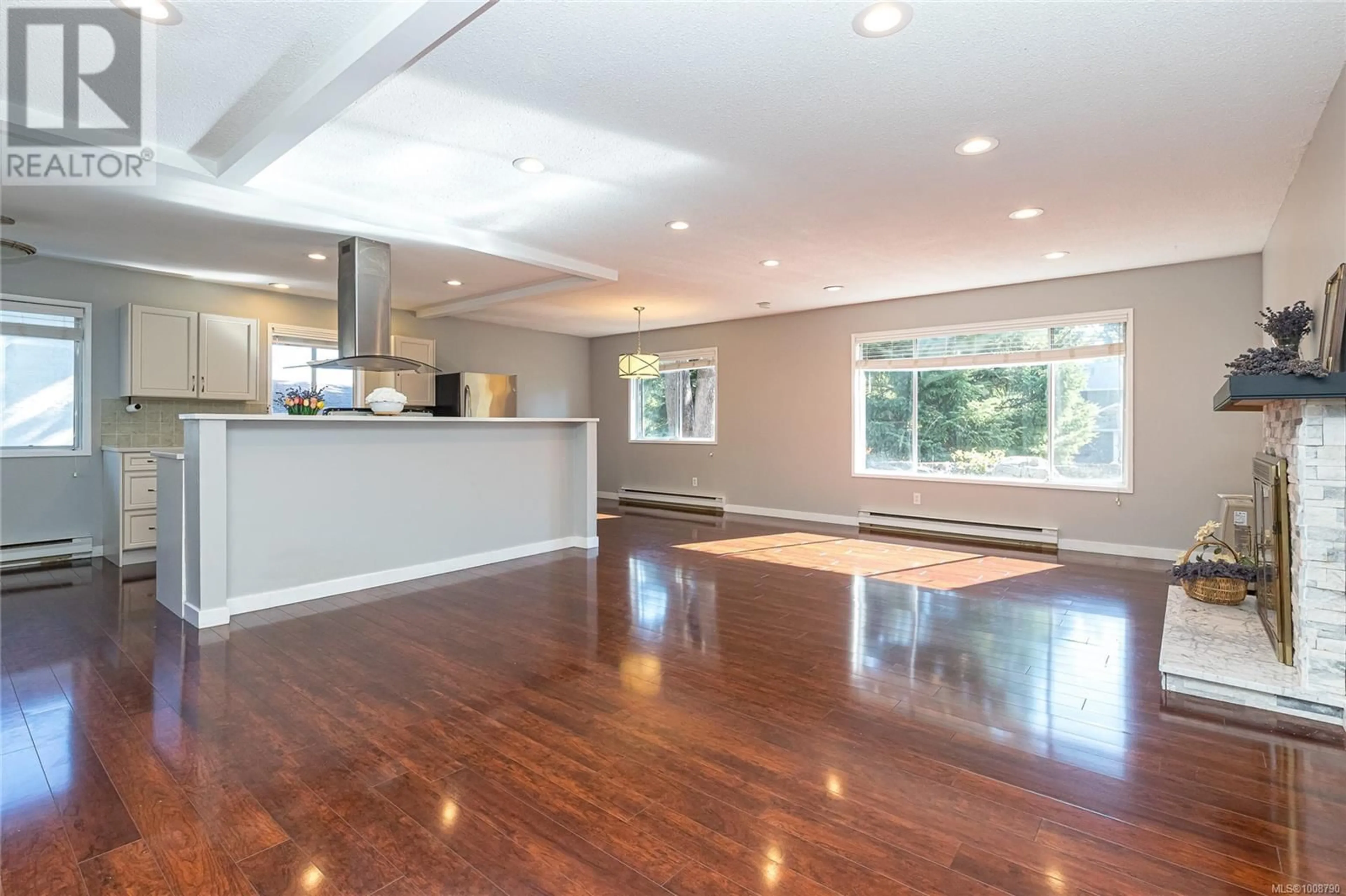 Open concept kitchen, wood/laminate floor for 4166 CROSSHAVEN CLOSE, Saanich British Columbia V8X4H3