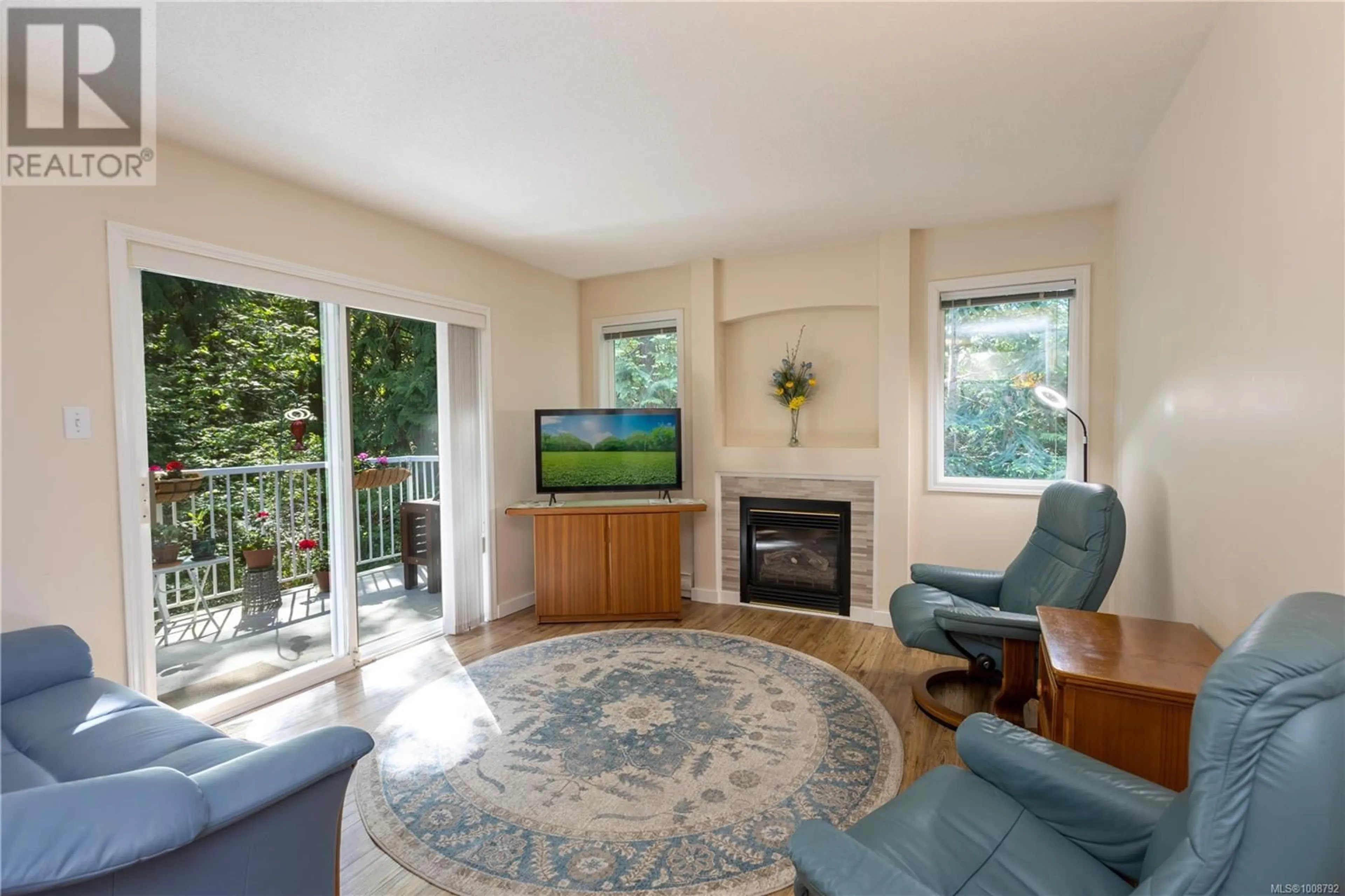 Living room with furniture, unknown for 208 - 440 SCHLEY PLACE, Qualicum Beach British Columbia V9K2M5
