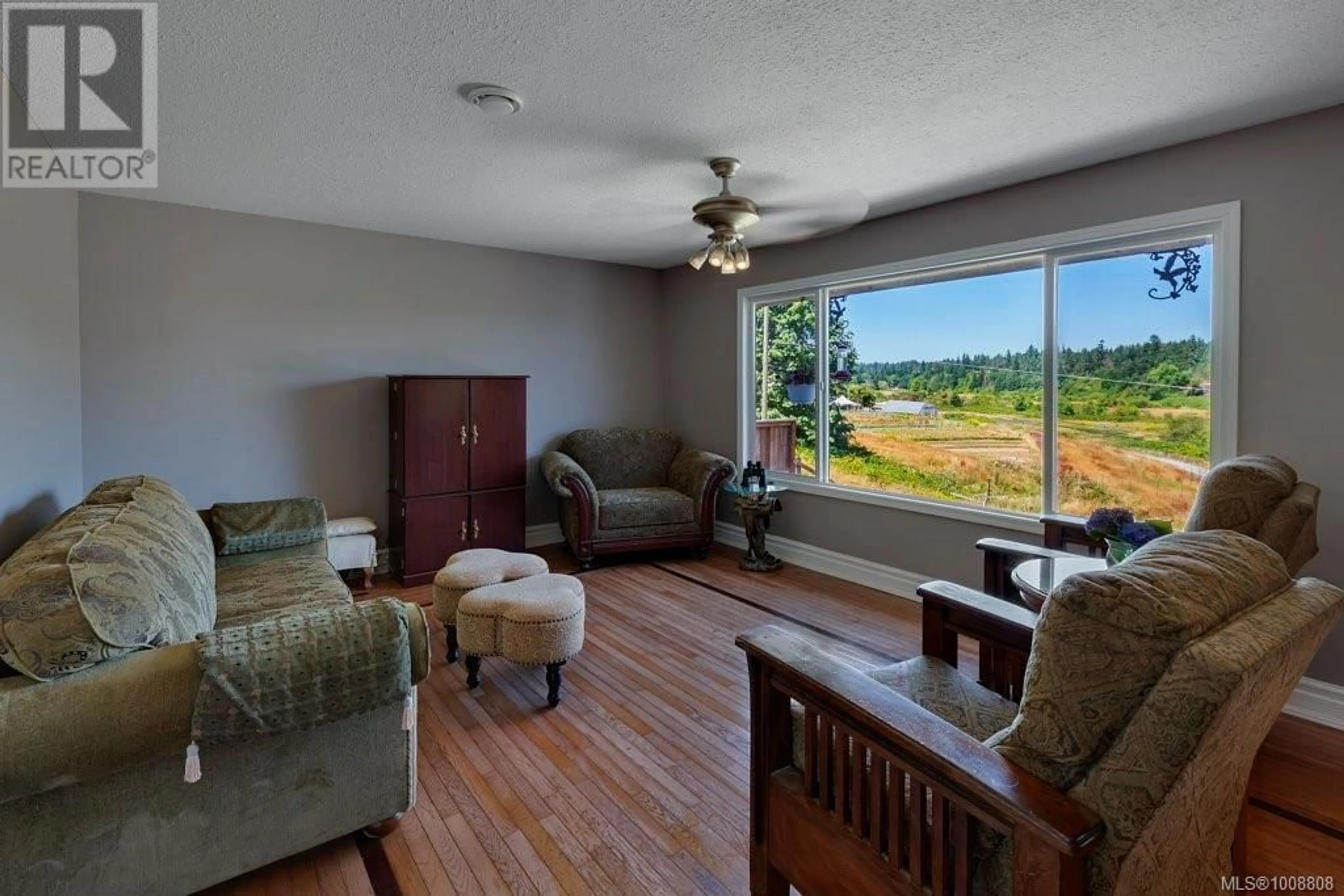 Living room with furniture, unknown for 2028 CATHERS DRIVE, Nanaimo British Columbia V9R6R9
