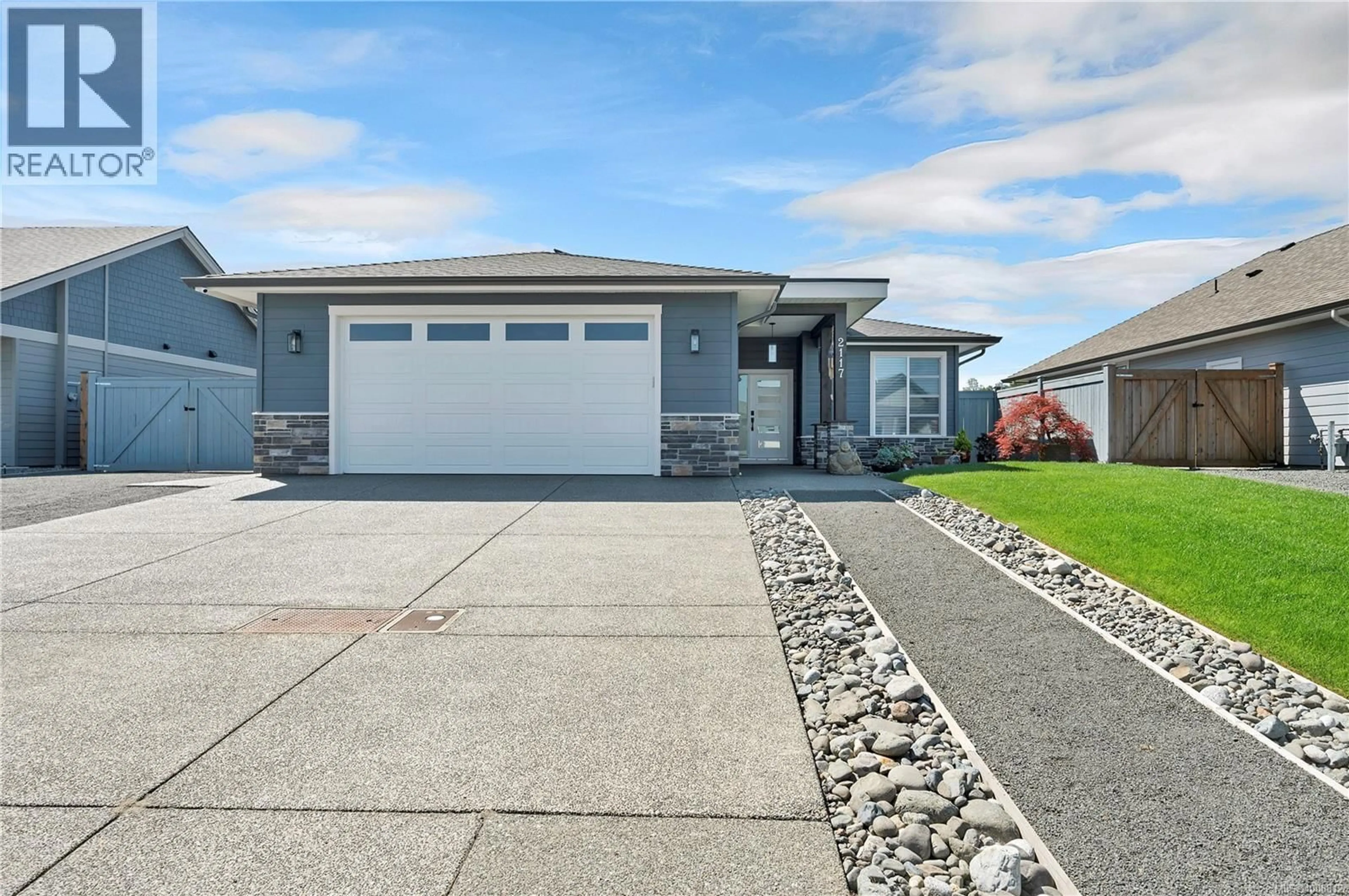 Home with vinyl exterior material, street for 2117 EVERGREEN ROAD, Campbell River British Columbia V9W0C8