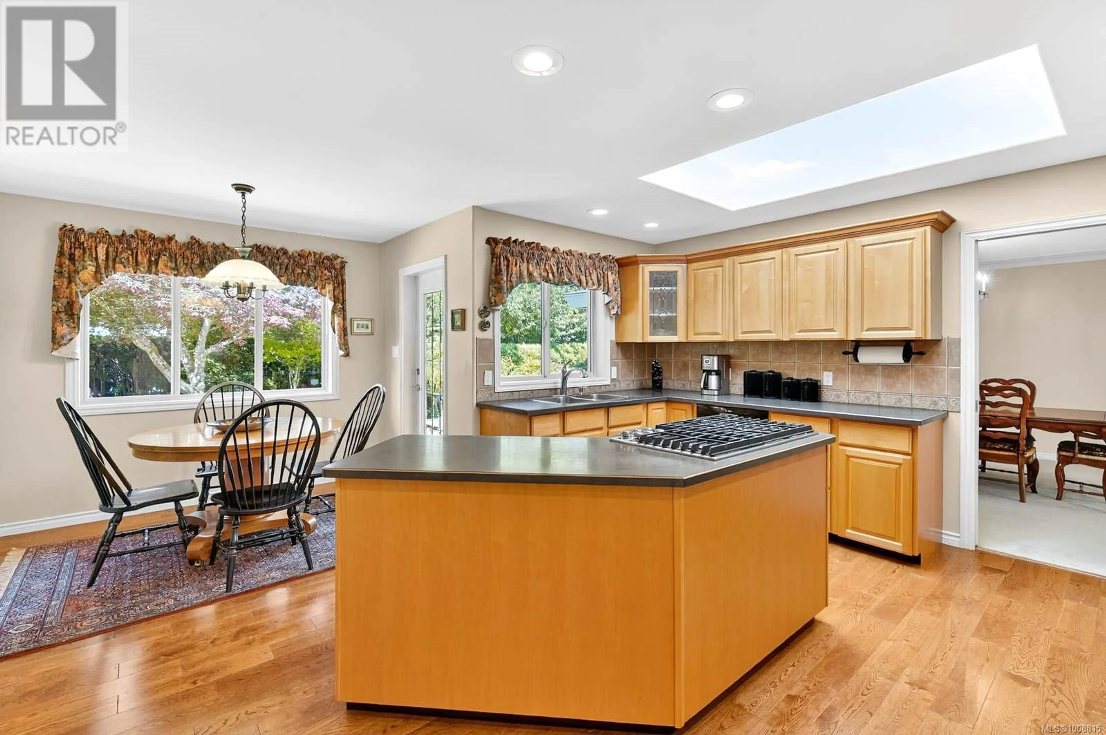 Open concept kitchen, ceramic/tile floor for 5528 WOODLAND CRESCENT WEST, Port Alberni British Columbia V9Y8E6