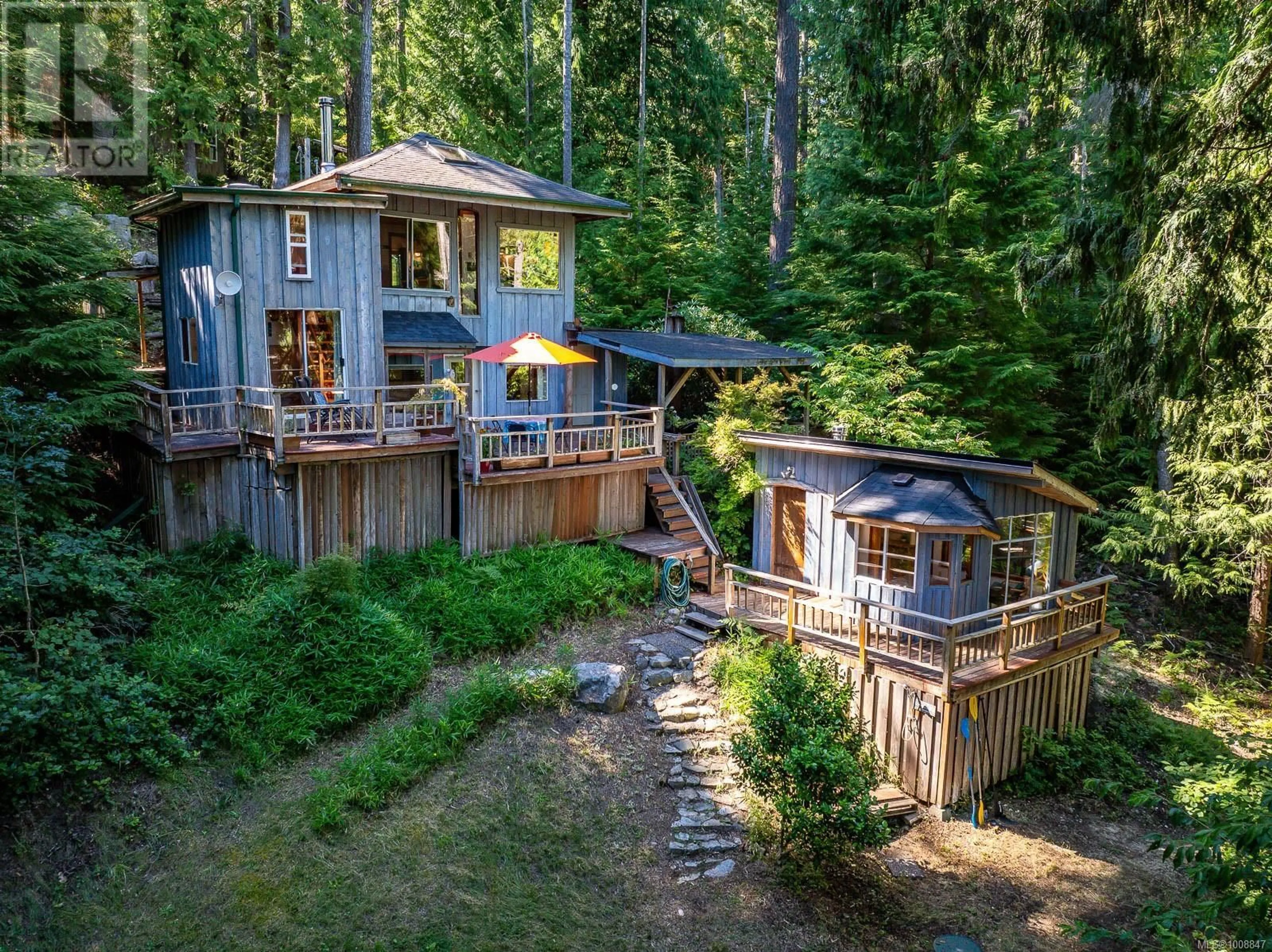 A pic from outside/outdoor area/front of a property/back of a property/a pic from drone, forest/trees view for 838 SUTIL POINT ROAD, Cortes Island British Columbia V0P1K0