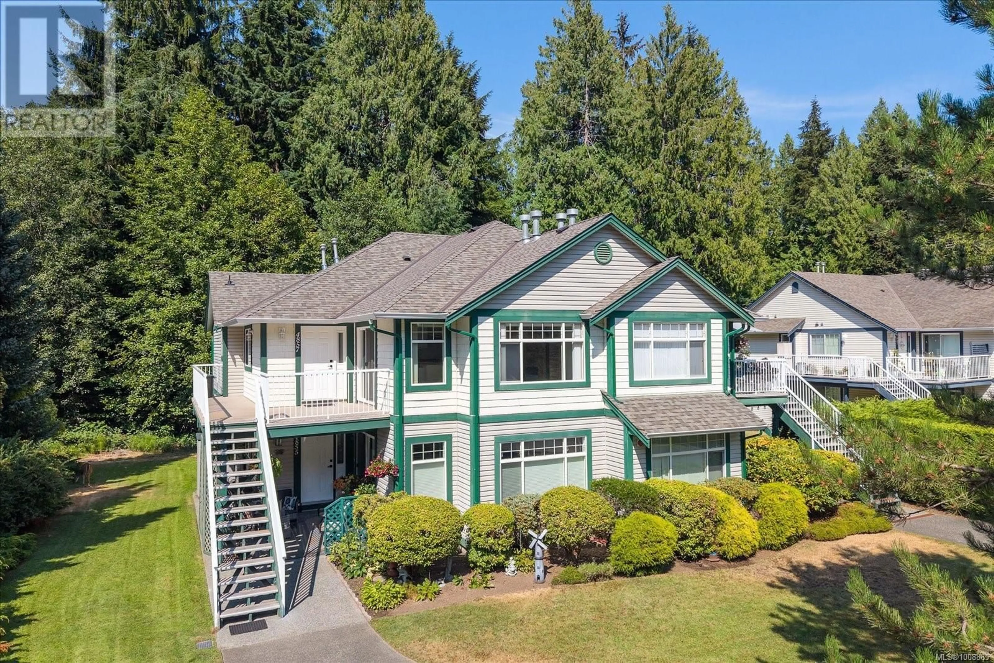 A pic from outside/outdoor area/front of a property/back of a property/a pic from drone, mountain view for 4857 SALMON BERRY WAY, Nanaimo British Columbia V9V1T4