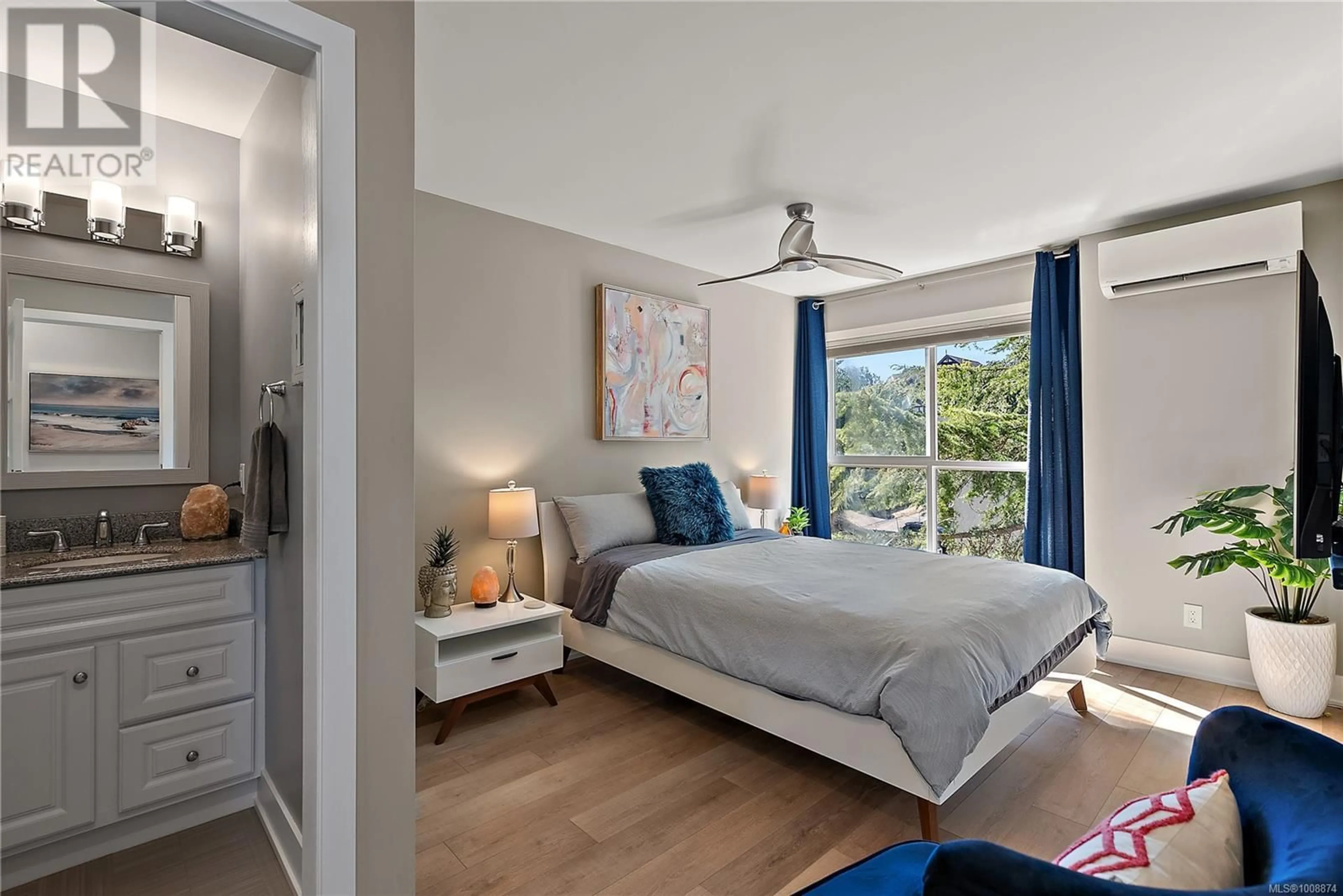 Bedroom with bed, wood/laminate floor for 411 - 2529 WARK STREET, Victoria British Columbia V8T4G7