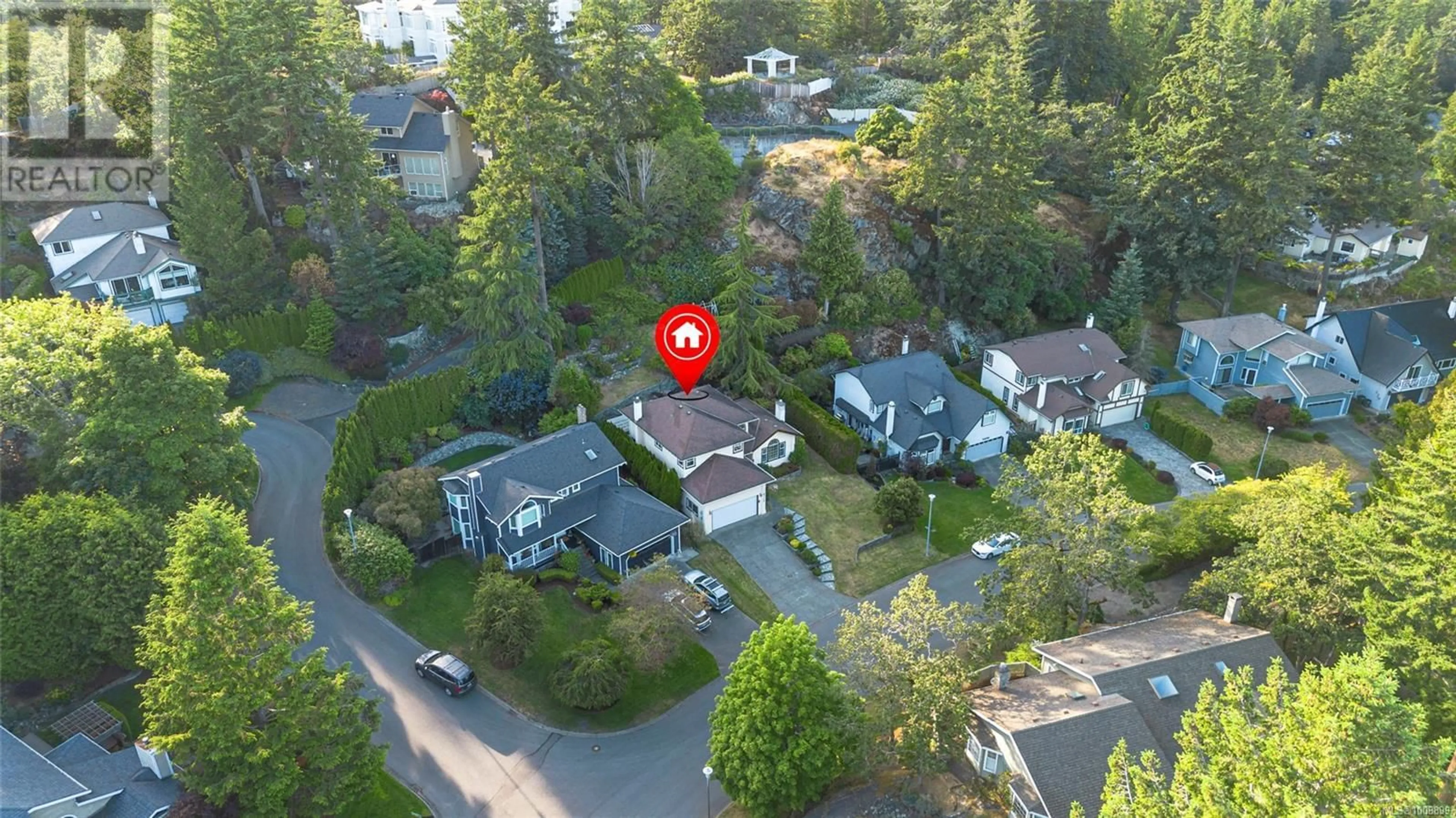 A pic from outside/outdoor area/front of a property/back of a property/a pic from drone, street for 4345 FAITHWOOD ROAD, Saanich British Columbia V8X4Z6