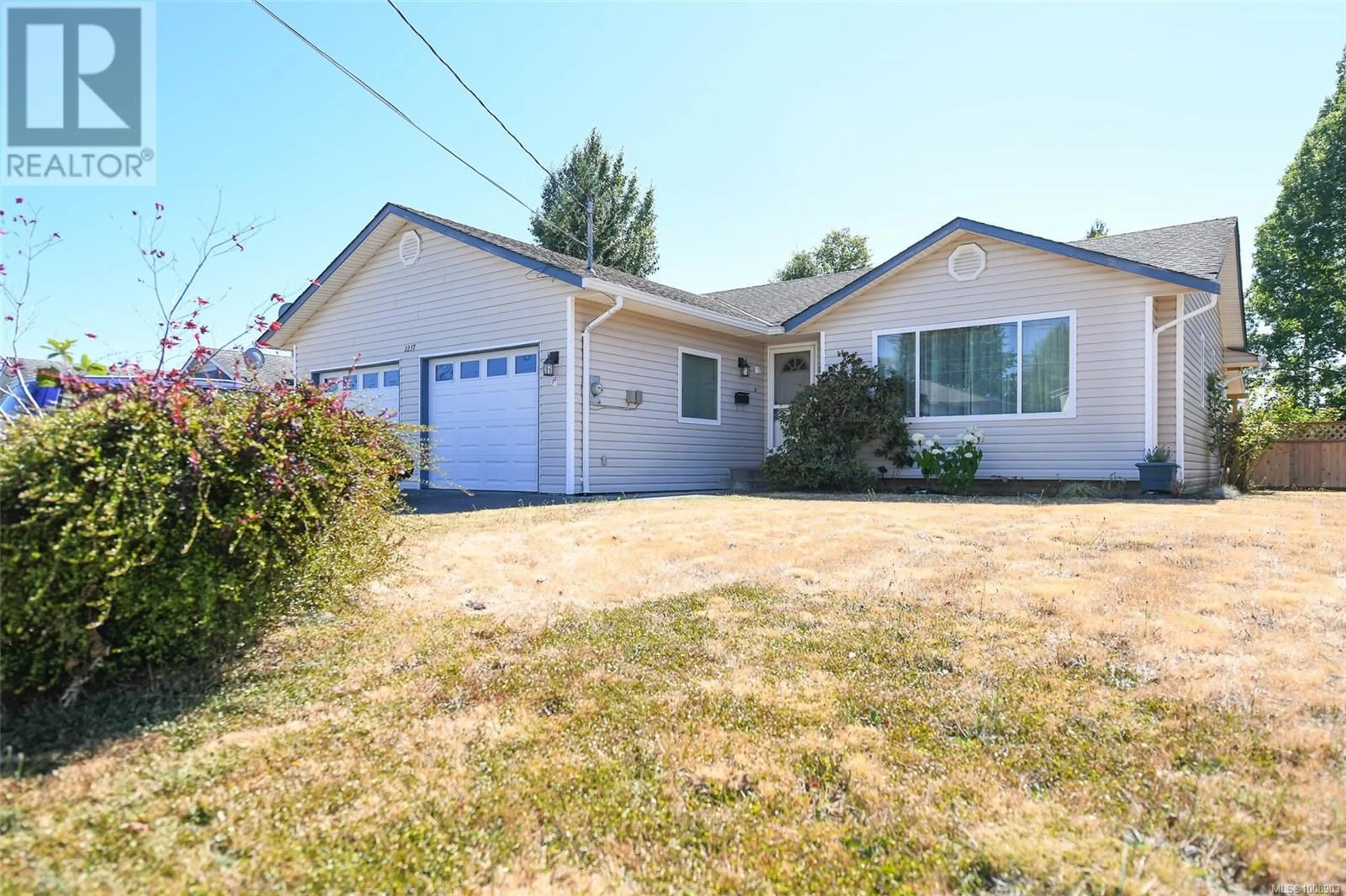 Home with vinyl exterior material, street for 2237 TULL AVENUE, Courtenay British Columbia V9N7S1