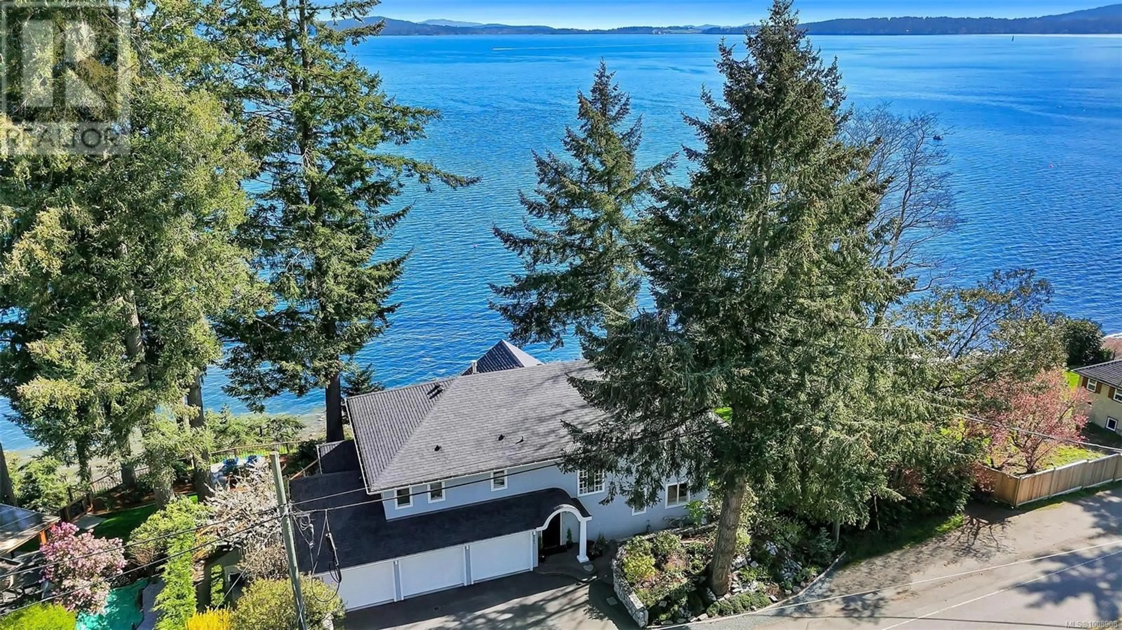 A pic from outside/outdoor area/front of a property/back of a property/a pic from drone, water/lake/river/ocean view for 2401 MILL BAY ROAD, Mill Bay British Columbia V8H1B9