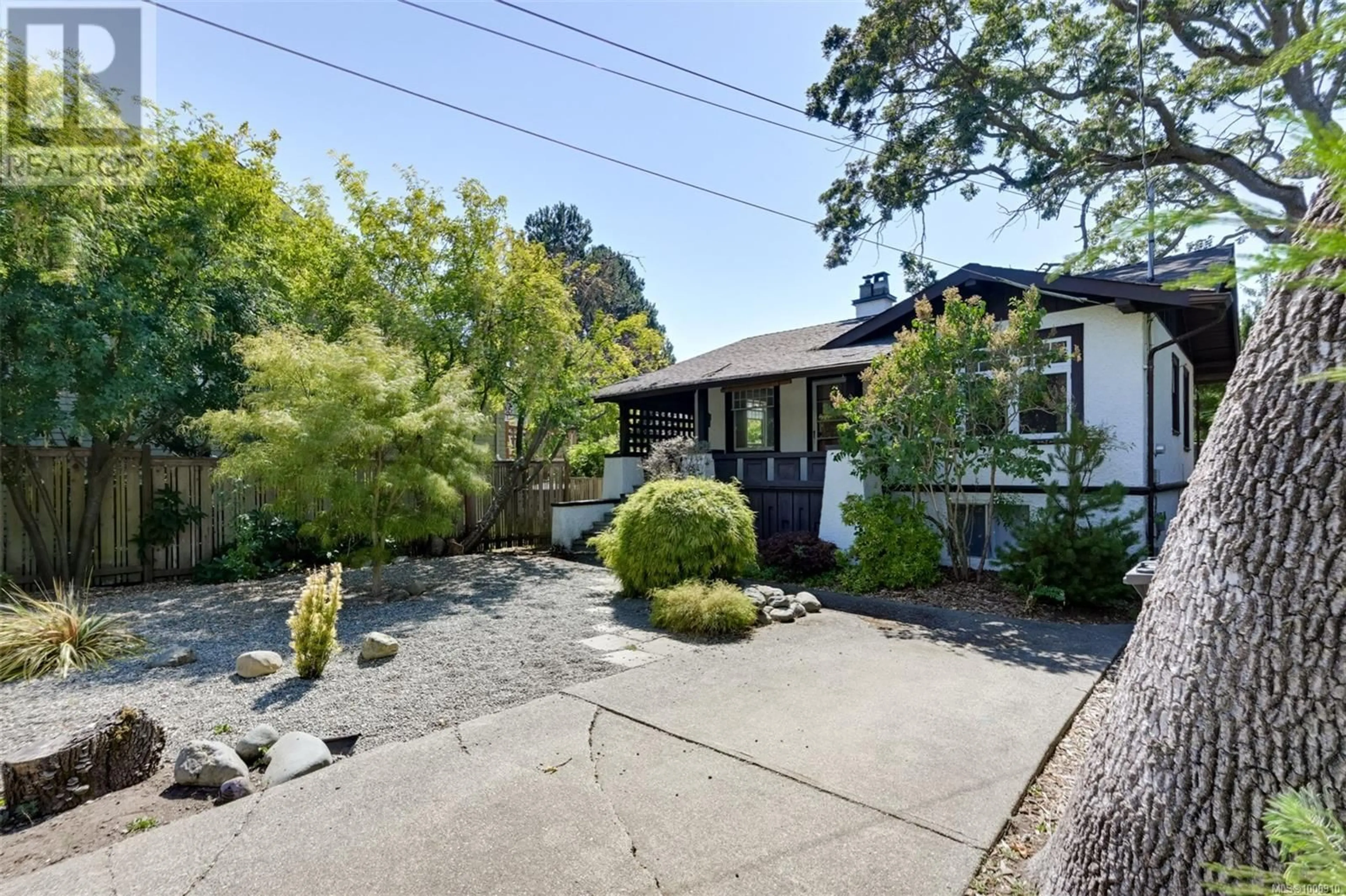 A pic from outside/outdoor area/front of a property/back of a property/a pic from drone, street for 1056 FOUL BAY ROAD, Oak Bay British Columbia V8S4J2