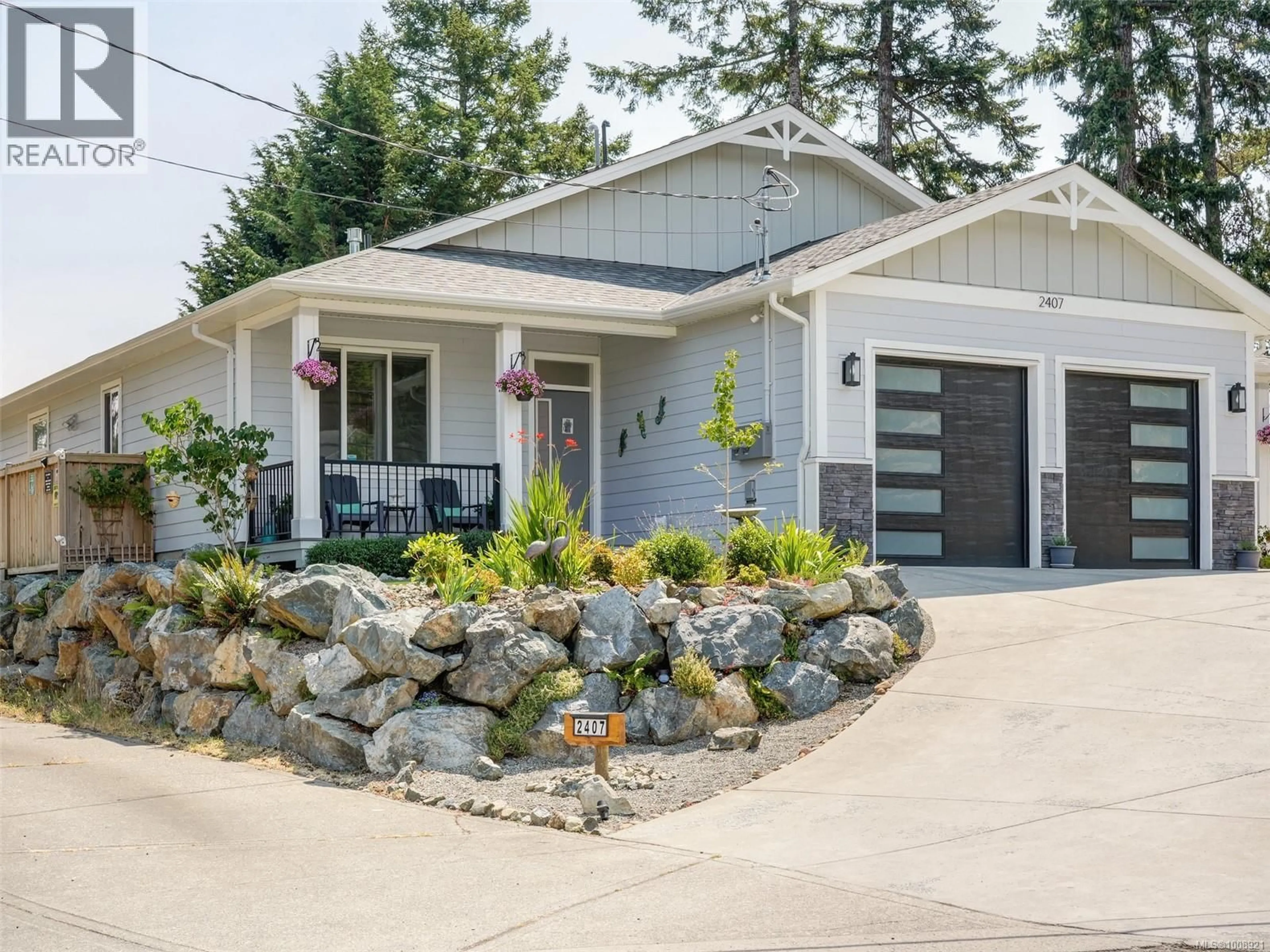 Home with vinyl exterior material, street for 2407 MOUNTAIN HEIGHTS DRIVE, Sooke British Columbia V9Z0L4