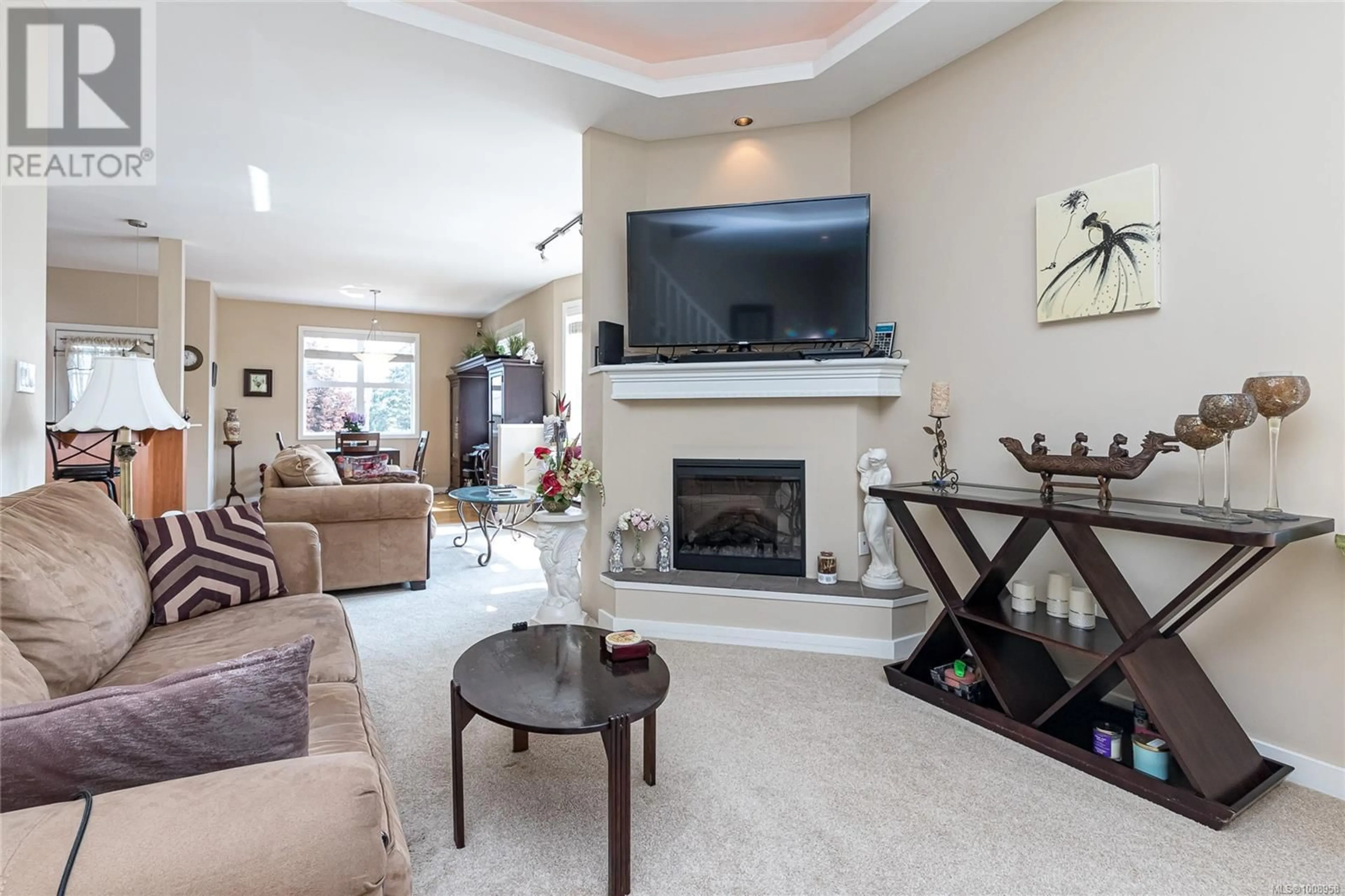 Living room with furniture, unknown for 2900 HIPWOOD LANE, Victoria British Columbia V8T5L3