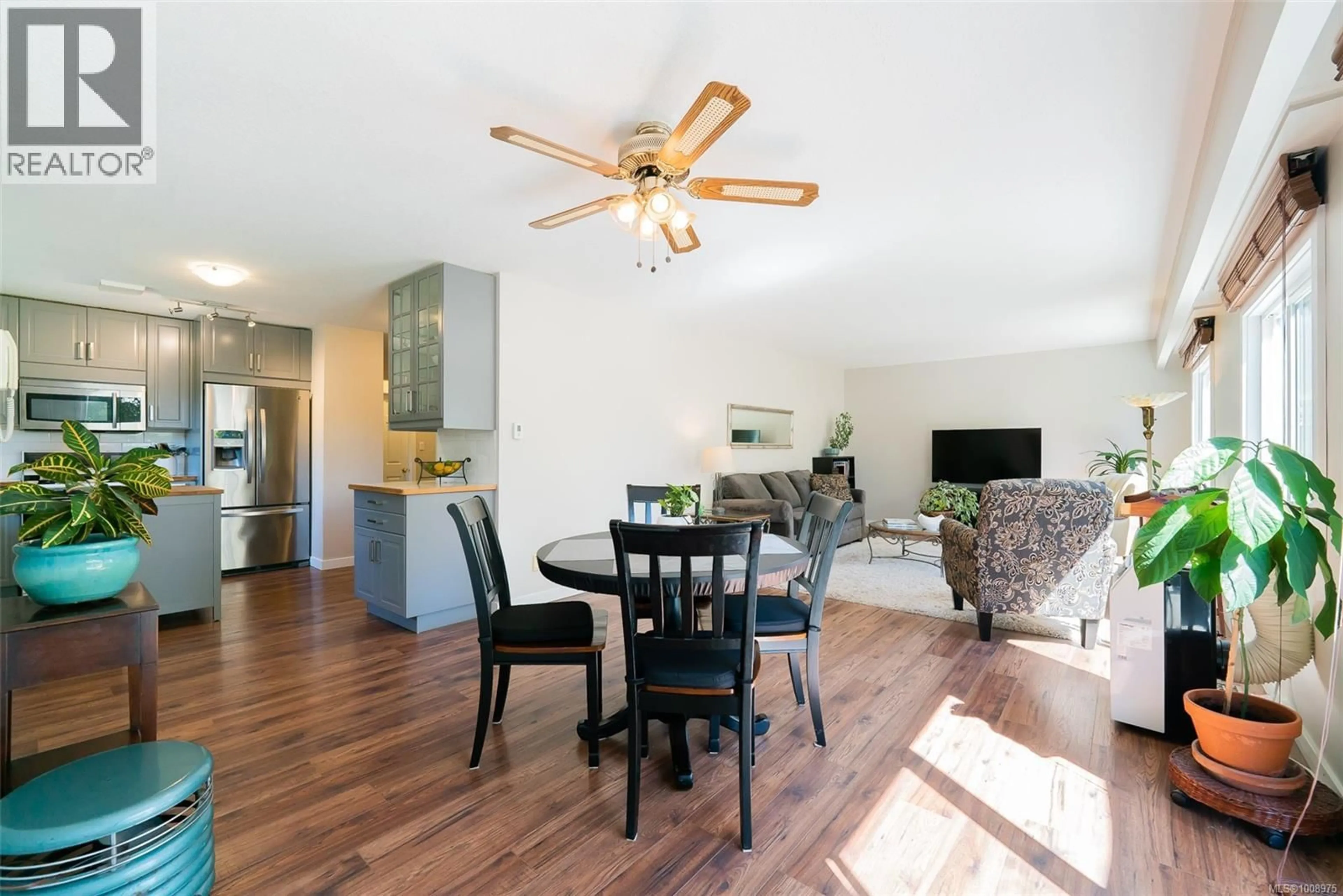 Living room with furniture, wood/laminate floor for 2030 BRIX ROAD, Nanaimo British Columbia V9X1L7
