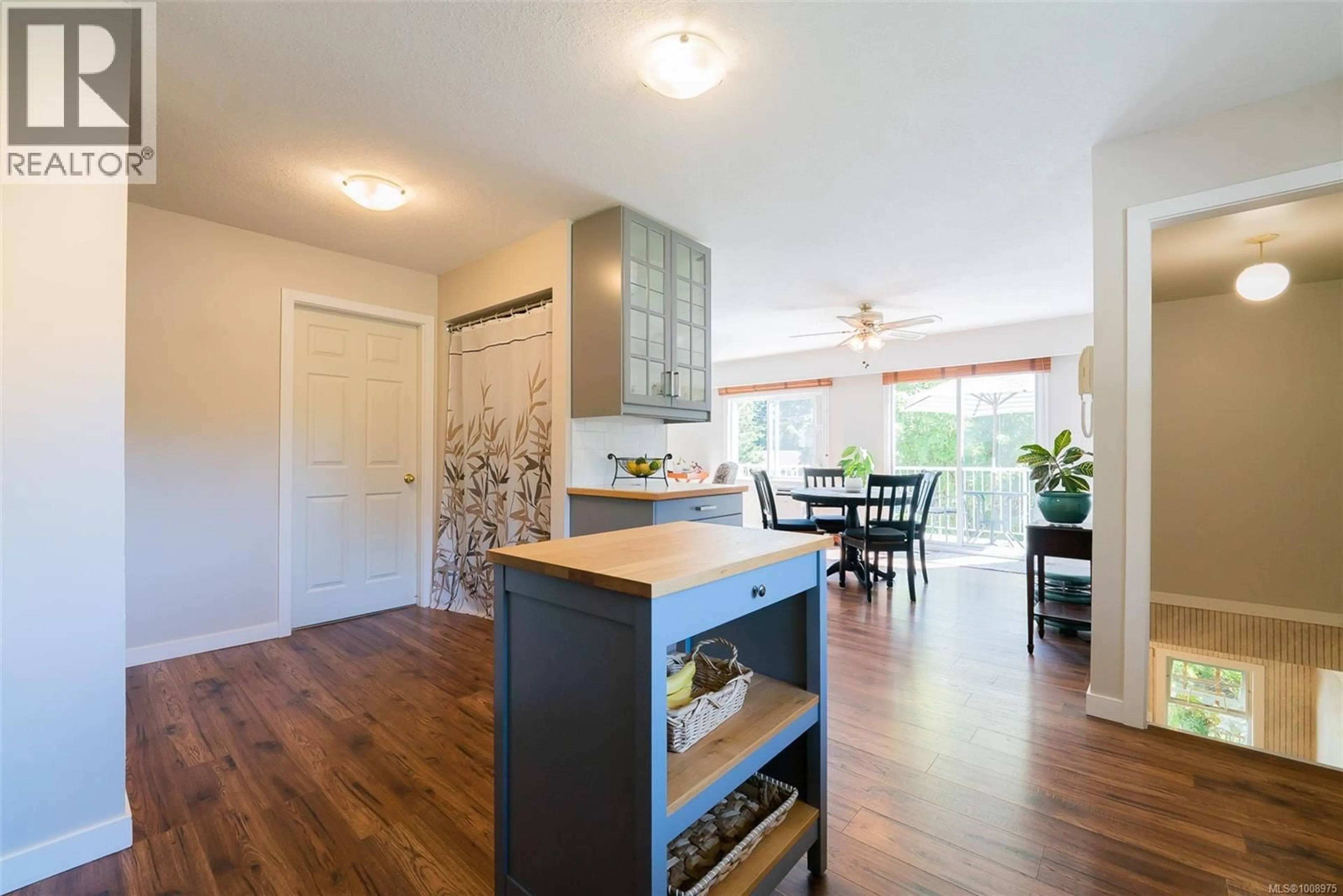 Open concept kitchen, wood/laminate floor for 2030 BRIX ROAD, Nanaimo British Columbia V9X1L7