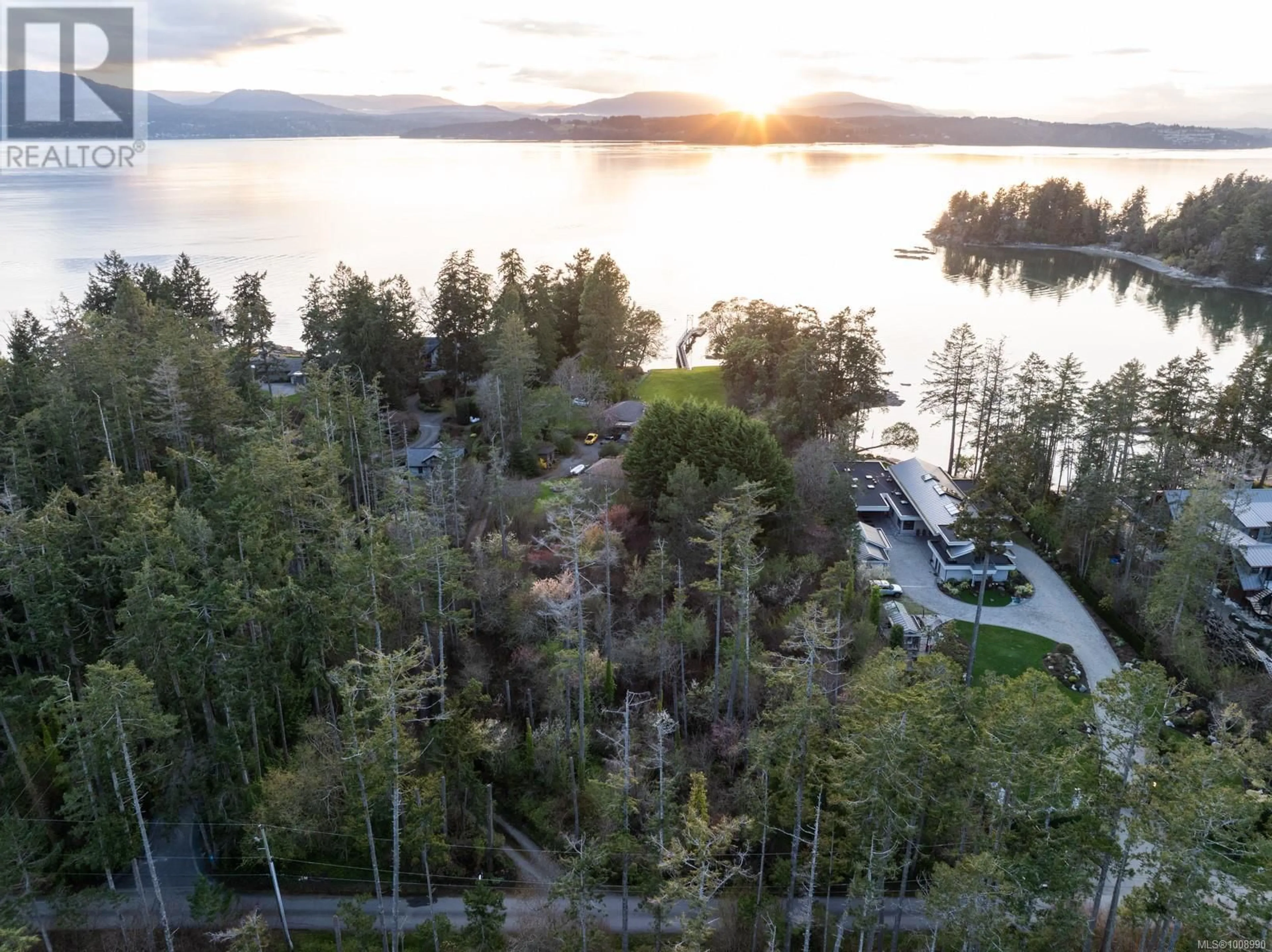 A pic from outside/outdoor area/front of a property/back of a property/a pic from drone, water/lake/river/ocean view for 675 TOWNER PARK ROAD, North Saanich British Columbia V8L5L7