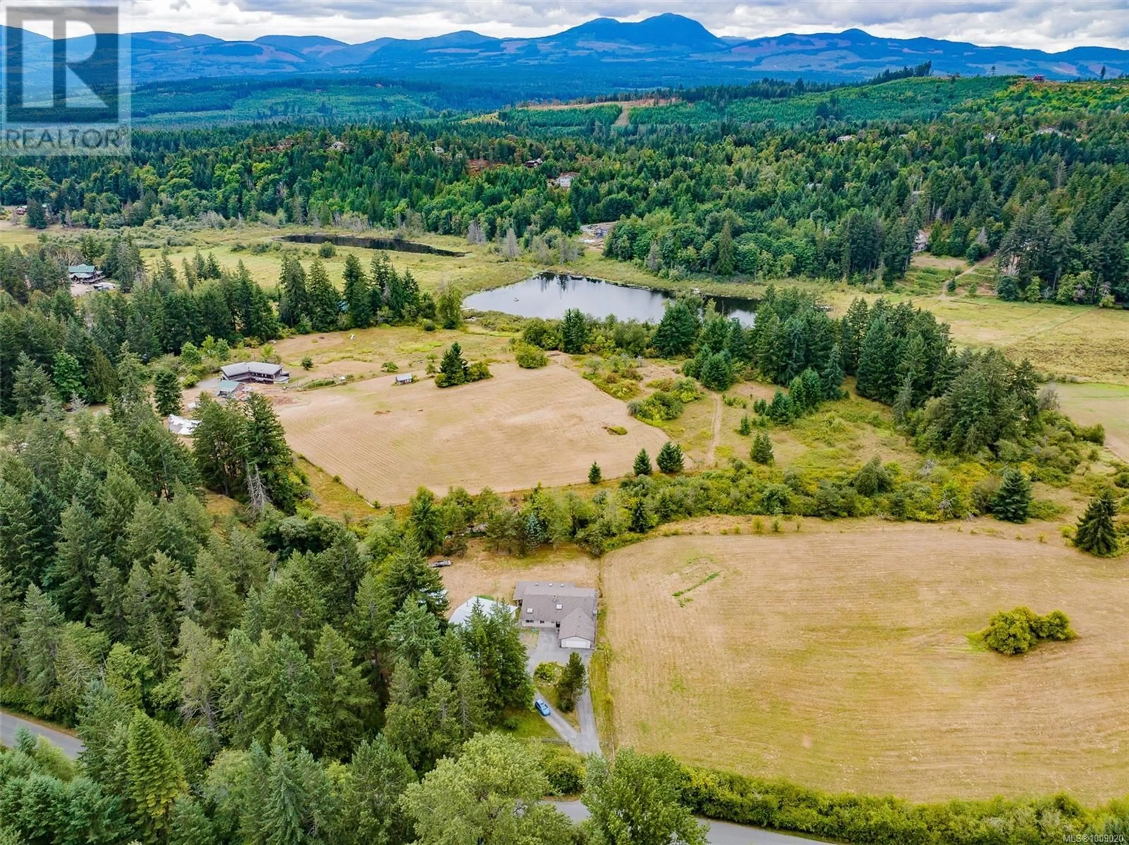A pic from outside/outdoor area/front of a property/back of a property/a pic from drone, water/lake/river/ocean view for 2445 GODFREY ROAD, Nanaimo British Columbia V9X1E6