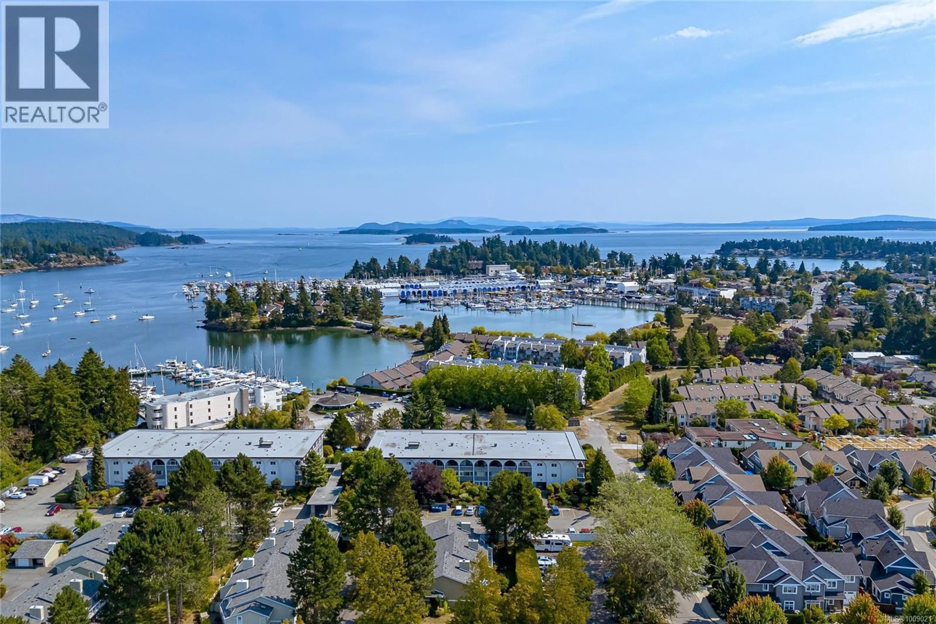 A pic from outside/outdoor area/front of a property/back of a property/a pic from drone, water/lake/river/ocean view for 108 - 2040 WHITE BIRCH ROAD, Sidney British Columbia V8L2R1