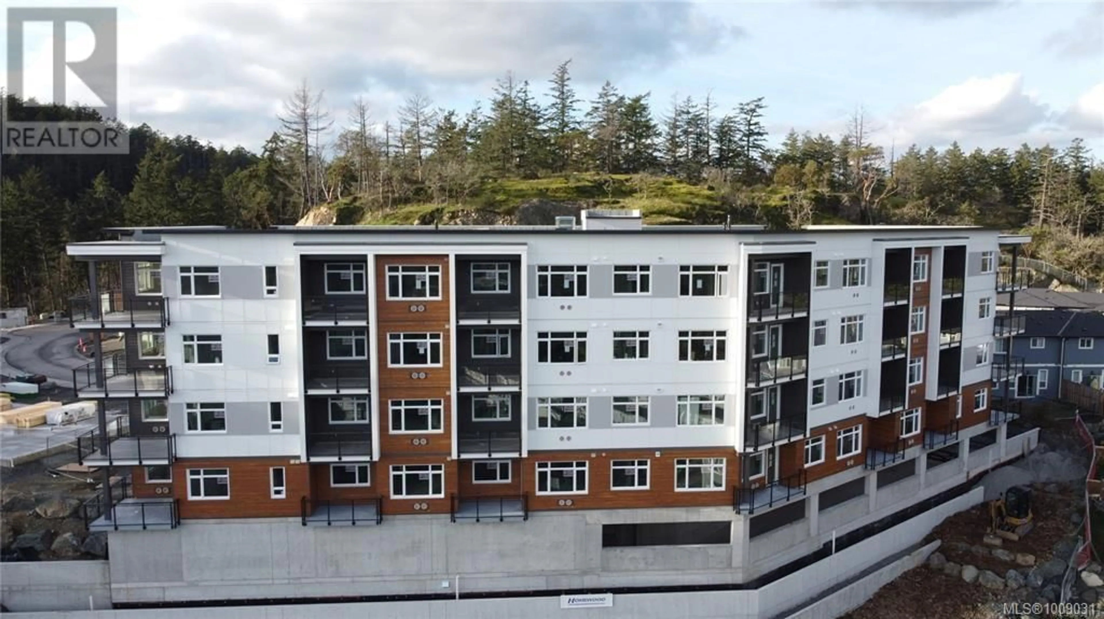 A pic from outside/outdoor area/front of a property/back of a property/a pic from drone, building for 101 - 2000 WEST PARK LANE, View Royal British Columbia V9B3R7