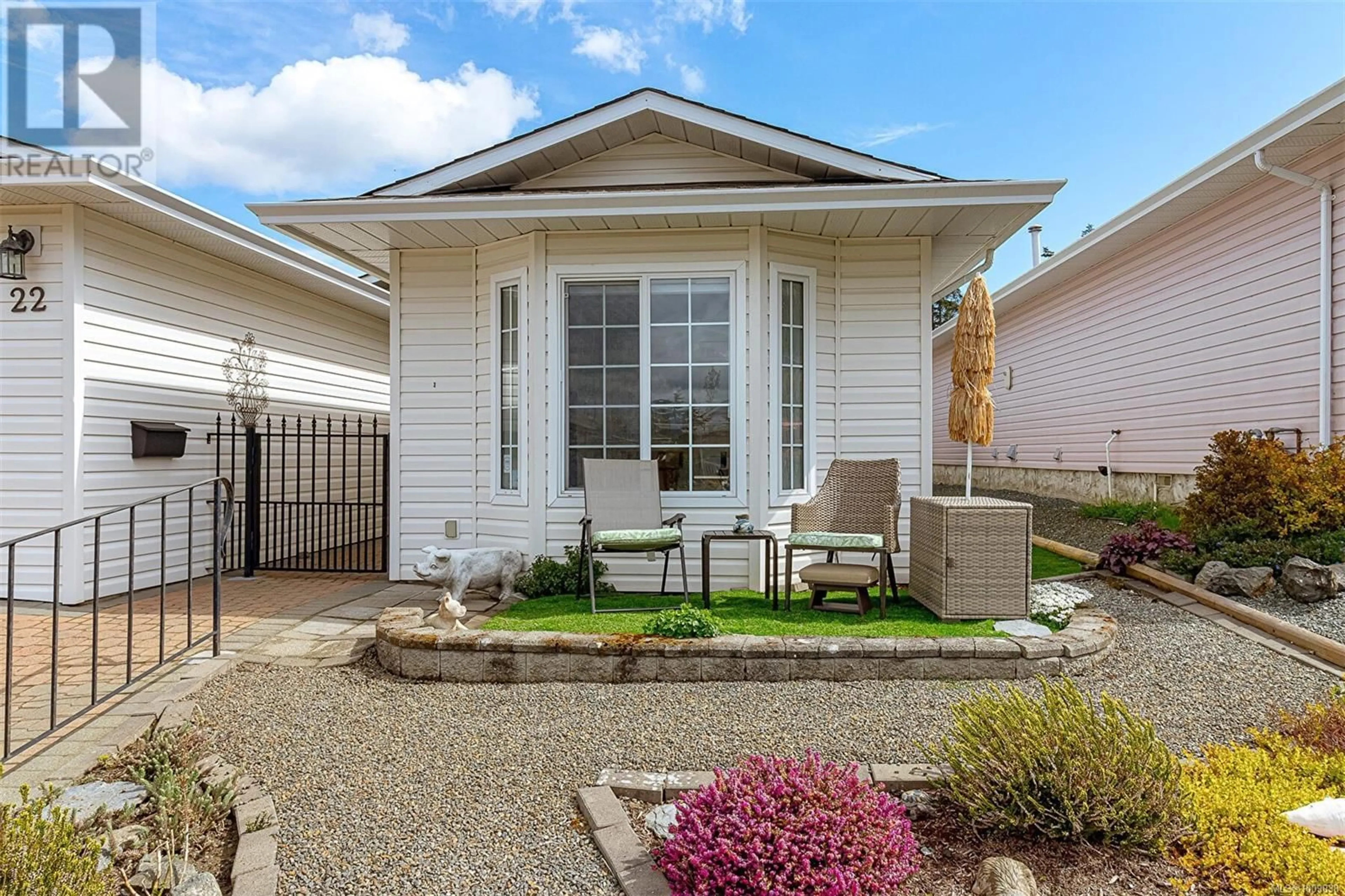 Home with vinyl exterior material, street for 22 EAGLE LANE, View Royal British Columbia V9A7M2