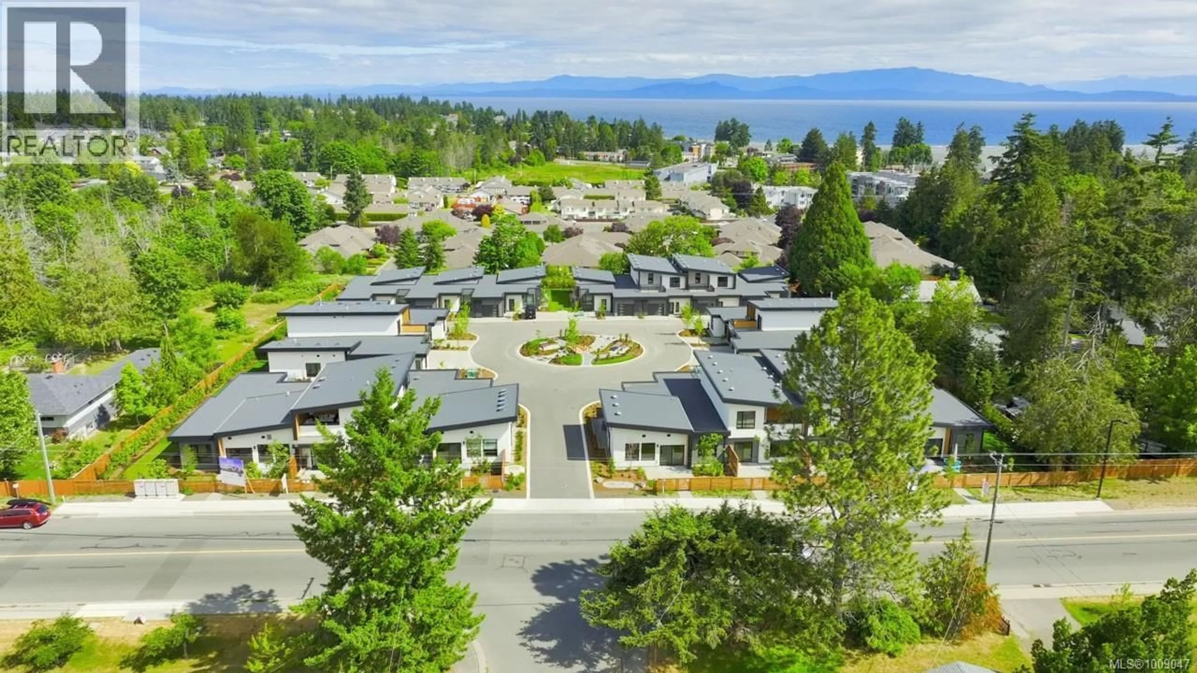 A pic from outside/outdoor area/front of a property/back of a property/a pic from drone, mountain view for 112 - 463 HIRST AVENUE, Parksville British Columbia V9P1J2