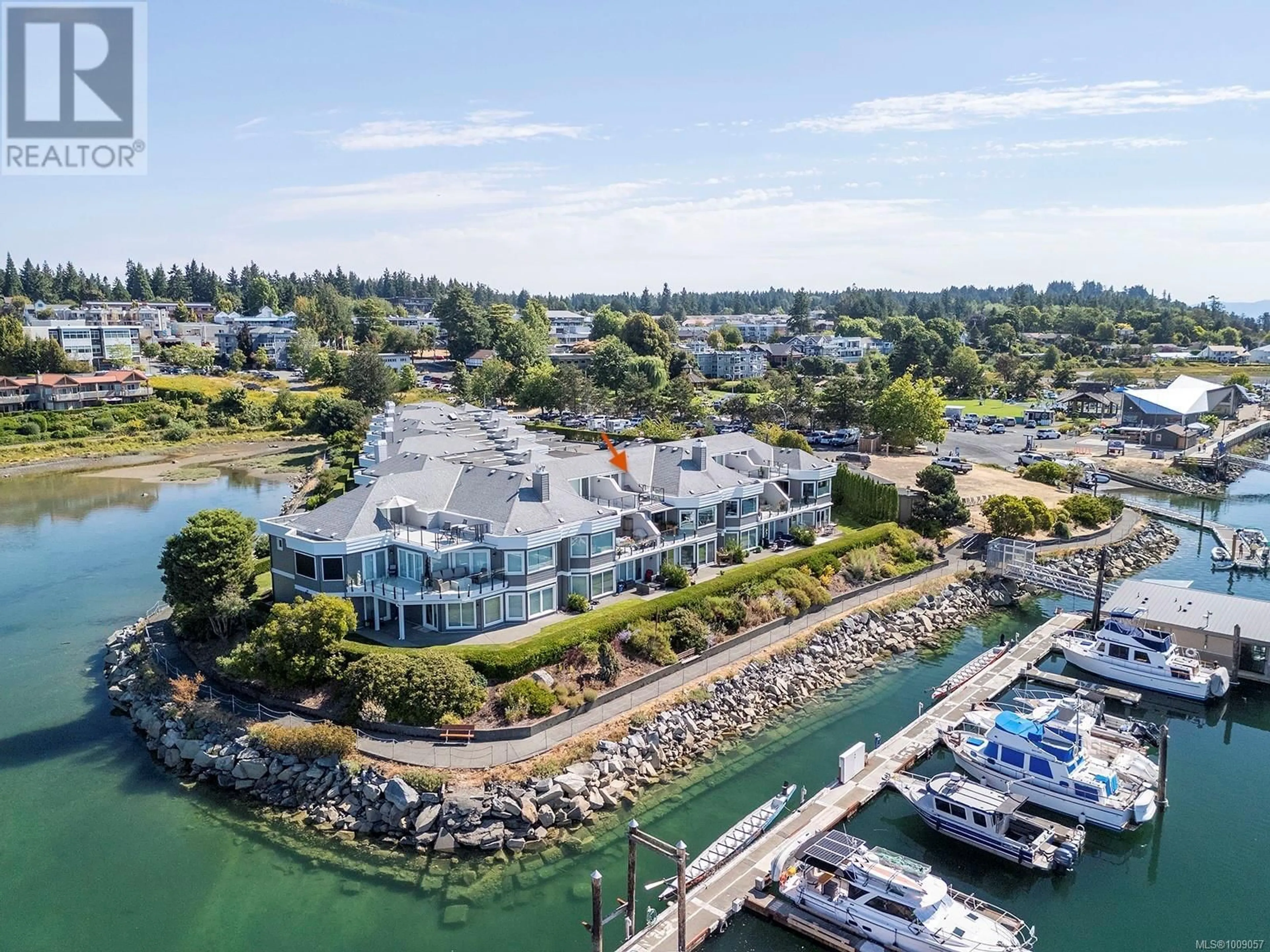 A pic from outside/outdoor area/front of a property/back of a property/a pic from drone, water/lake/river/ocean view for 108 - 1807 BEAUFORT AVENUE, Comox British Columbia V9M1R9