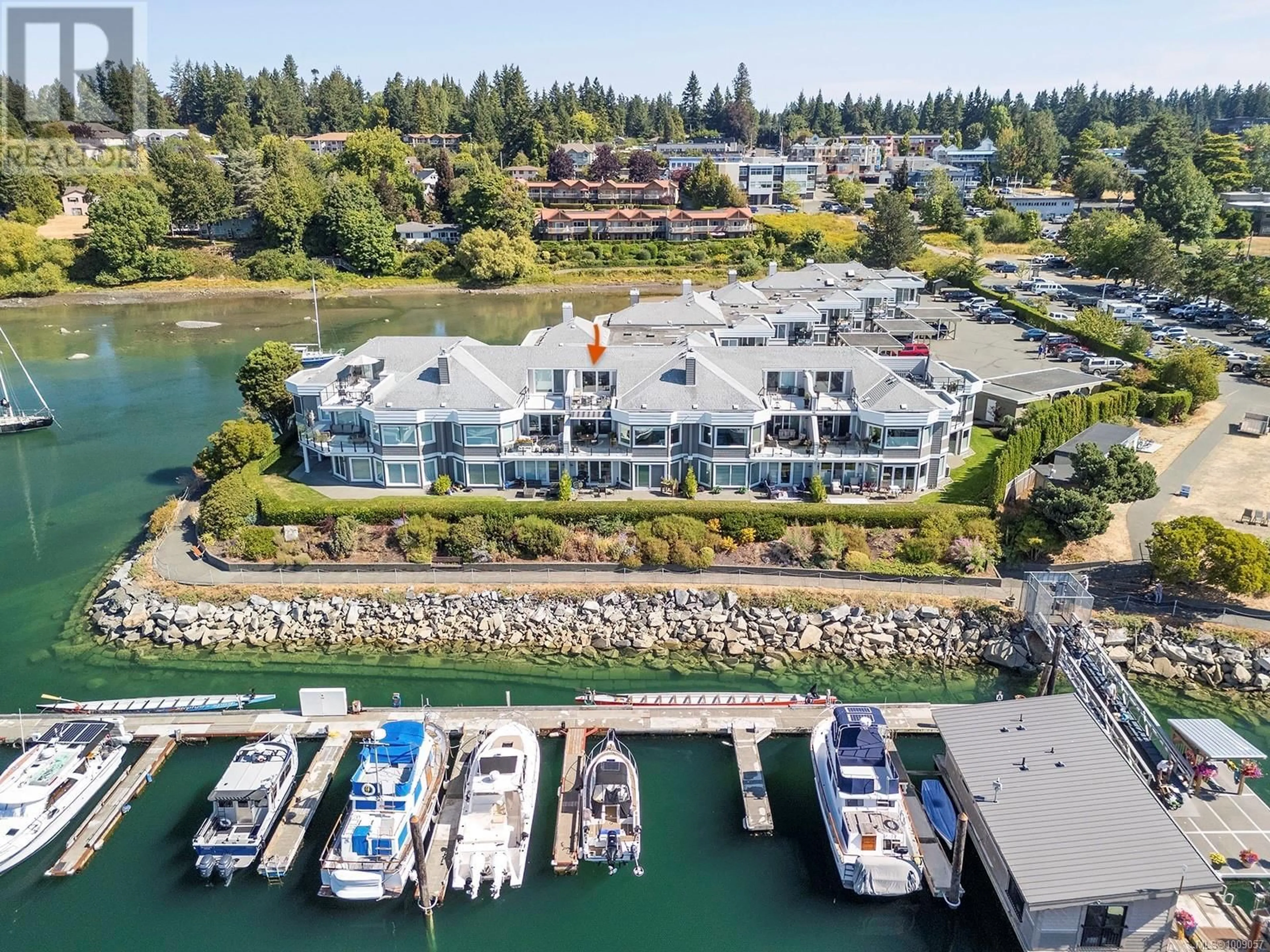 A pic from outside/outdoor area/front of a property/back of a property/a pic from drone, water/lake/river/ocean view for 108 - 1807 BEAUFORT AVENUE, Comox British Columbia V9M1R9