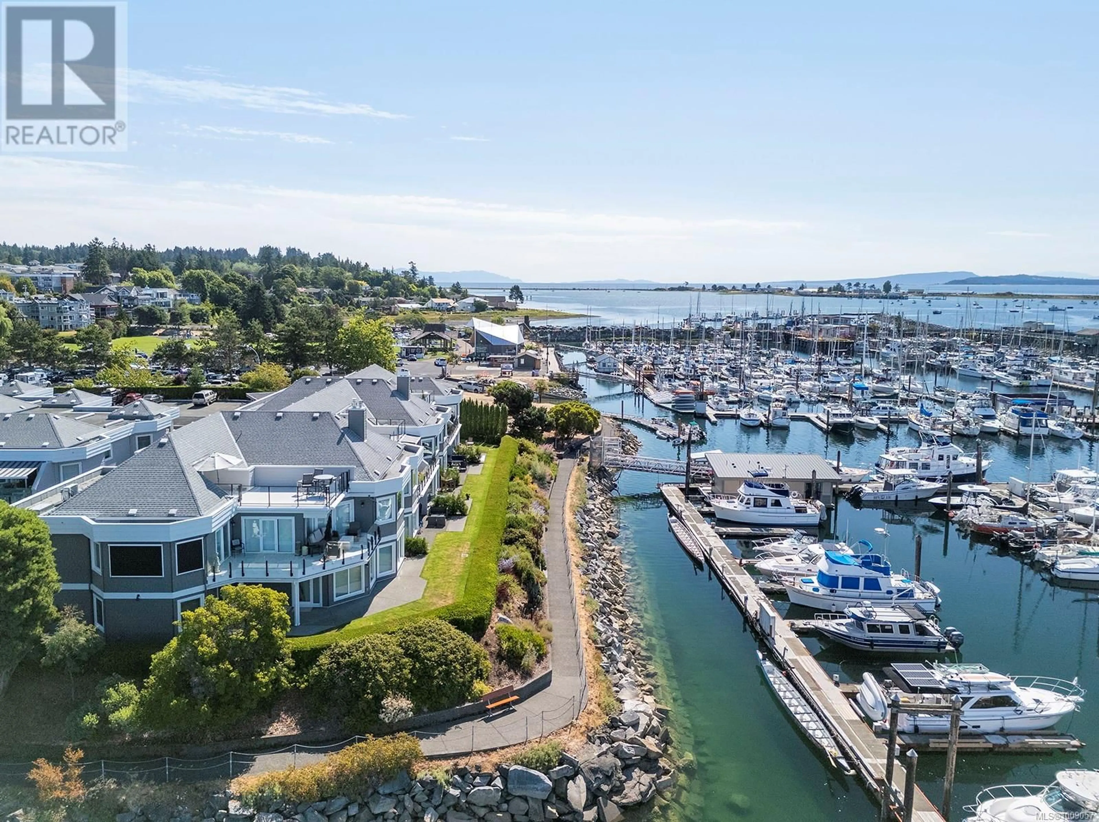 A pic from outside/outdoor area/front of a property/back of a property/a pic from drone, water/lake/river/ocean view for 108 - 1807 BEAUFORT AVENUE, Comox British Columbia V9M1R9