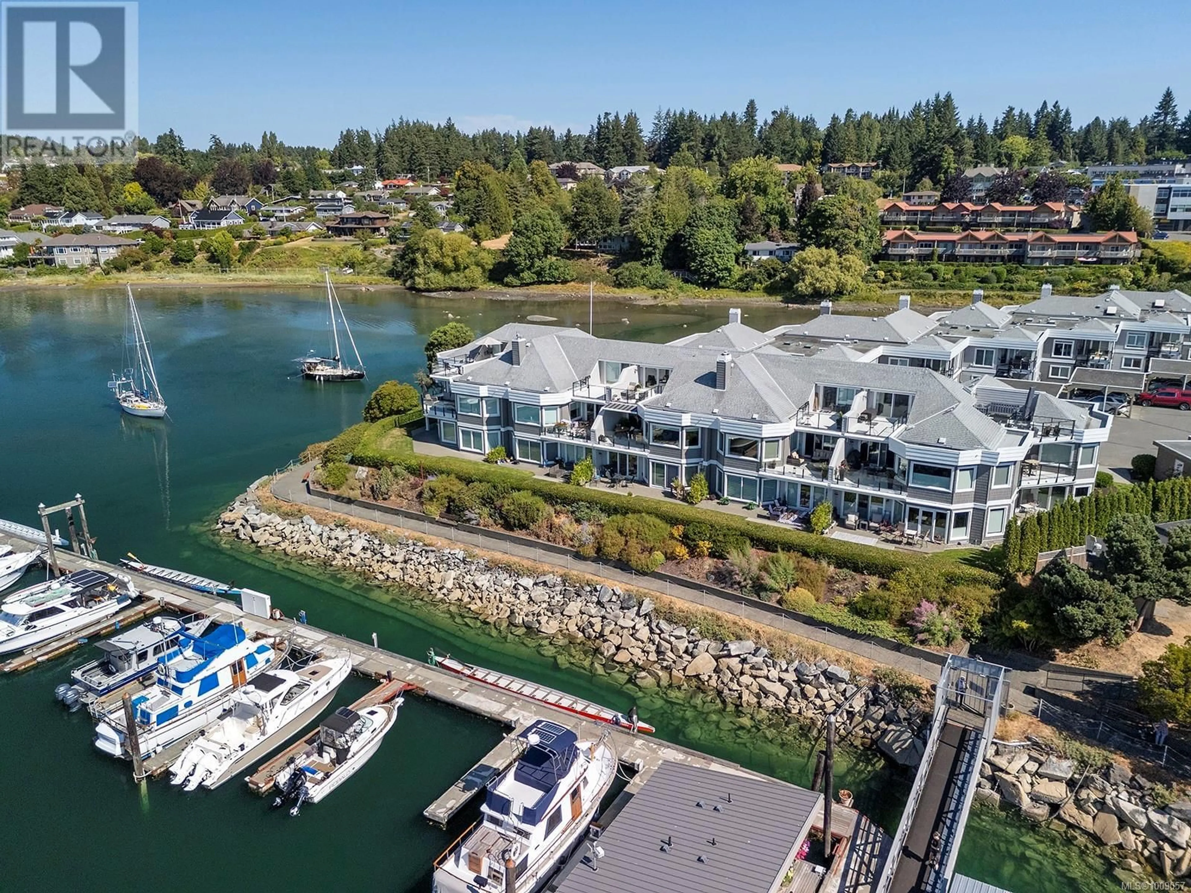 A pic from outside/outdoor area/front of a property/back of a property/a pic from drone, water/lake/river/ocean view for 108 - 1807 BEAUFORT AVENUE, Comox British Columbia V9M1R9