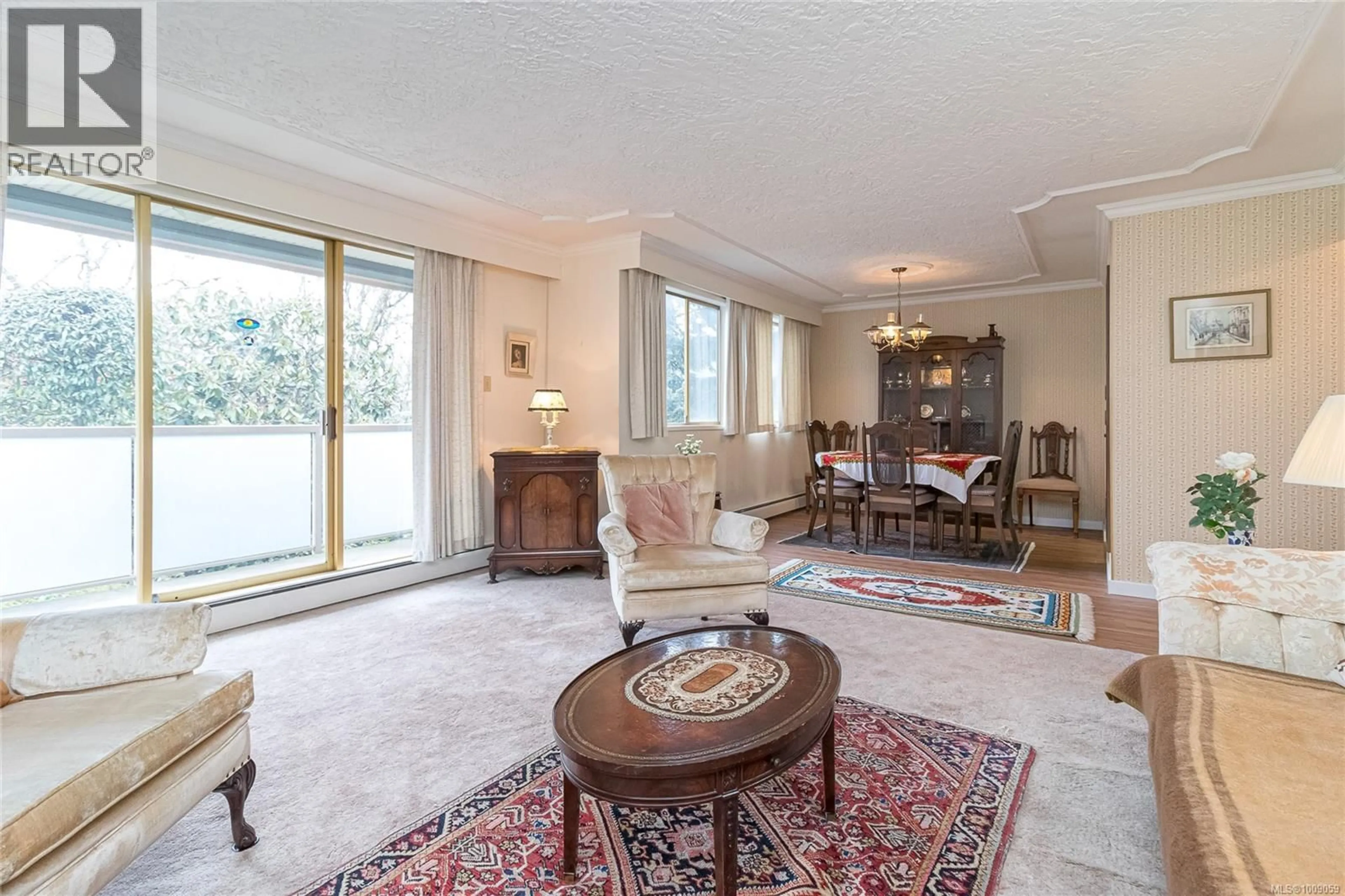Living room with furniture, carpet floor for 302 - 1025 INVERNESS ROAD, Saanich British Columbia V8X2S2