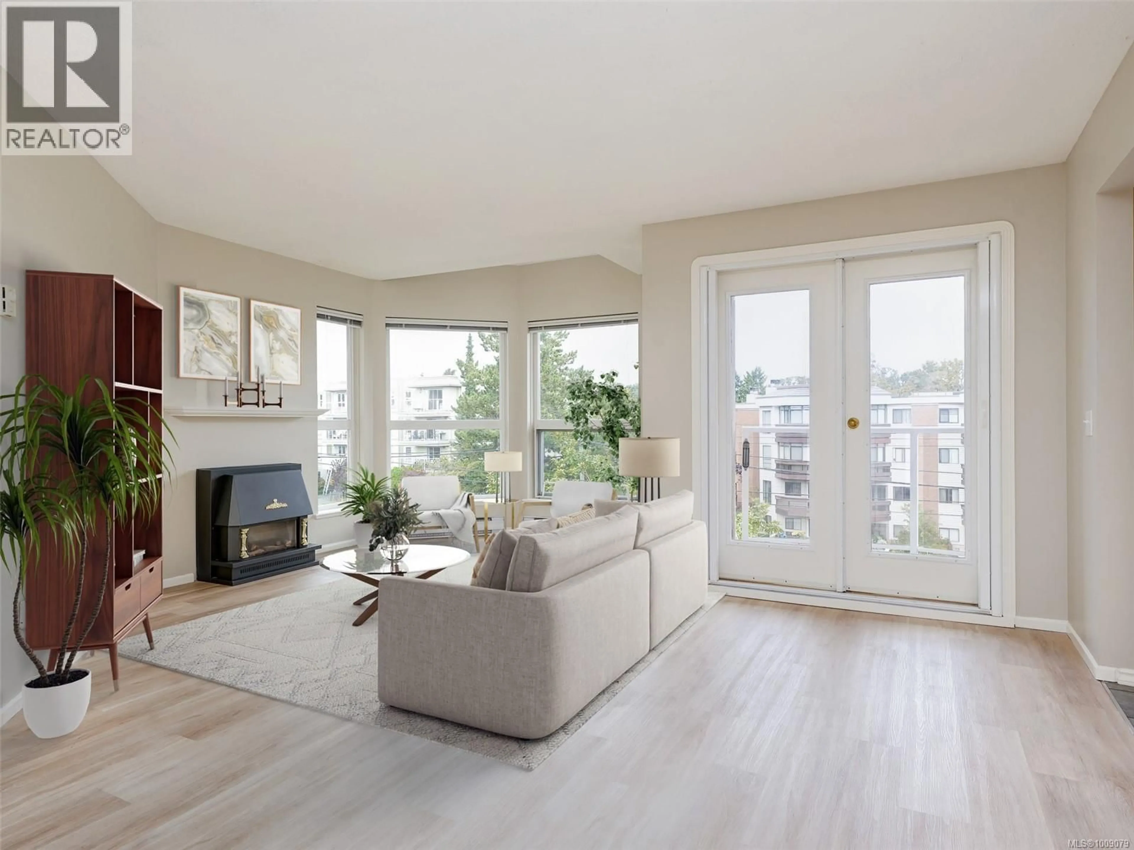 Living room with furniture, unknown for 402 - 1519 HILLSIDE AVENUE, Victoria British Columbia V8T2C1