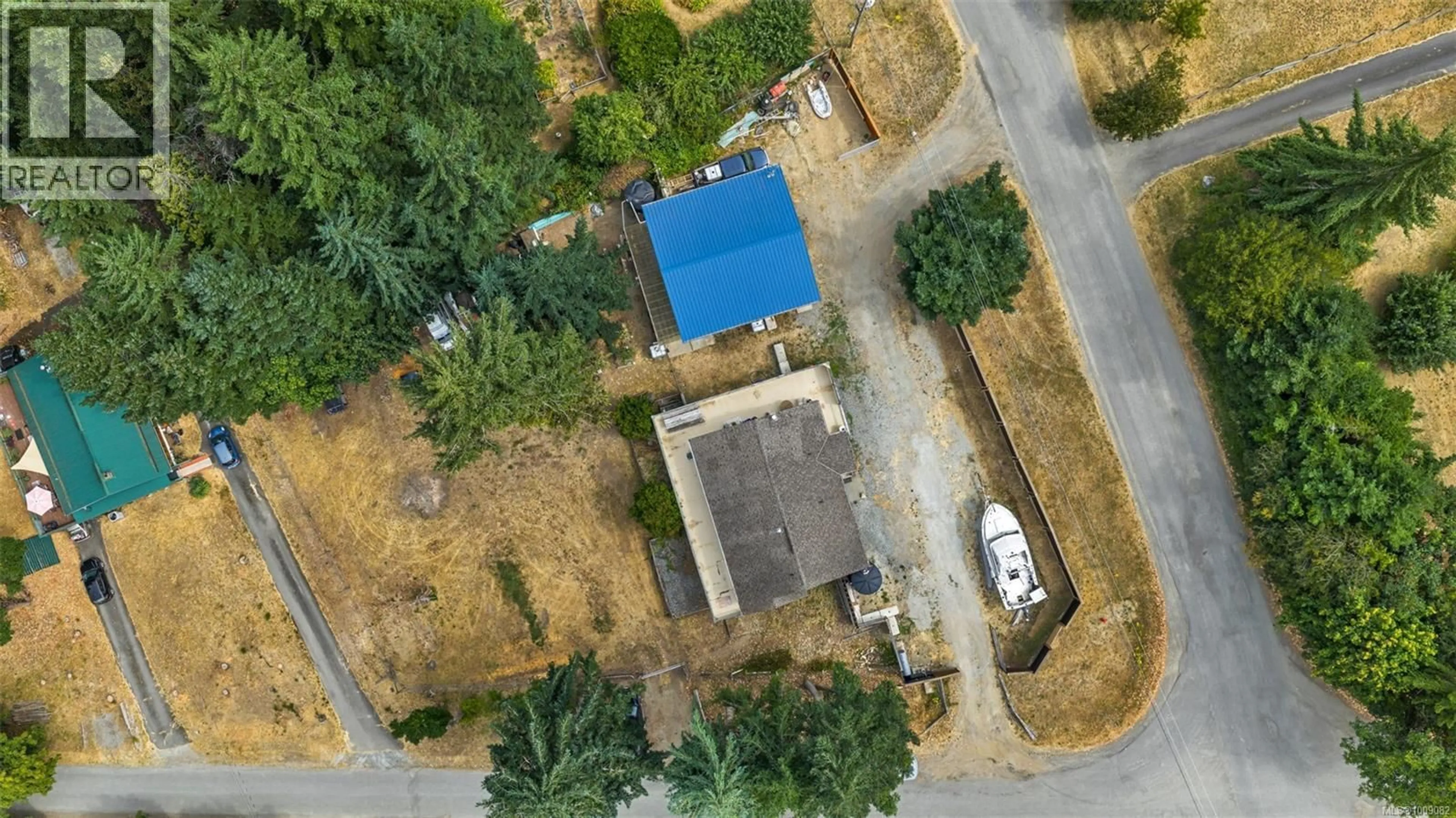 A pic from outside/outdoor area/front of a property/back of a property/a pic from drone, street for 386 COLLINS ROAD, Salt Spring British Columbia V8K2N1
