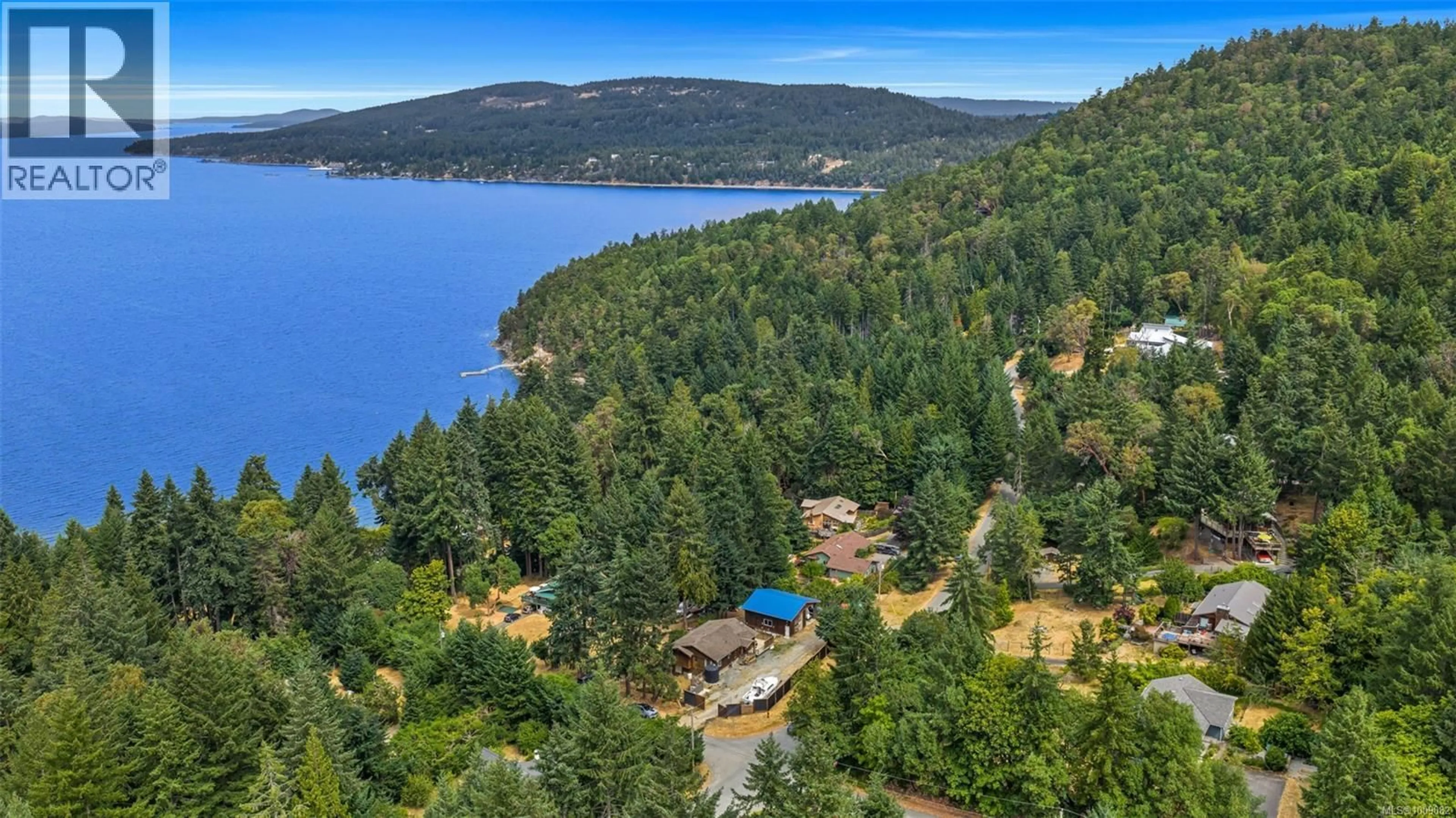 A pic from outside/outdoor area/front of a property/back of a property/a pic from drone, water/lake/river/ocean view for 386 COLLINS ROAD, Salt Spring British Columbia V8K2N1
