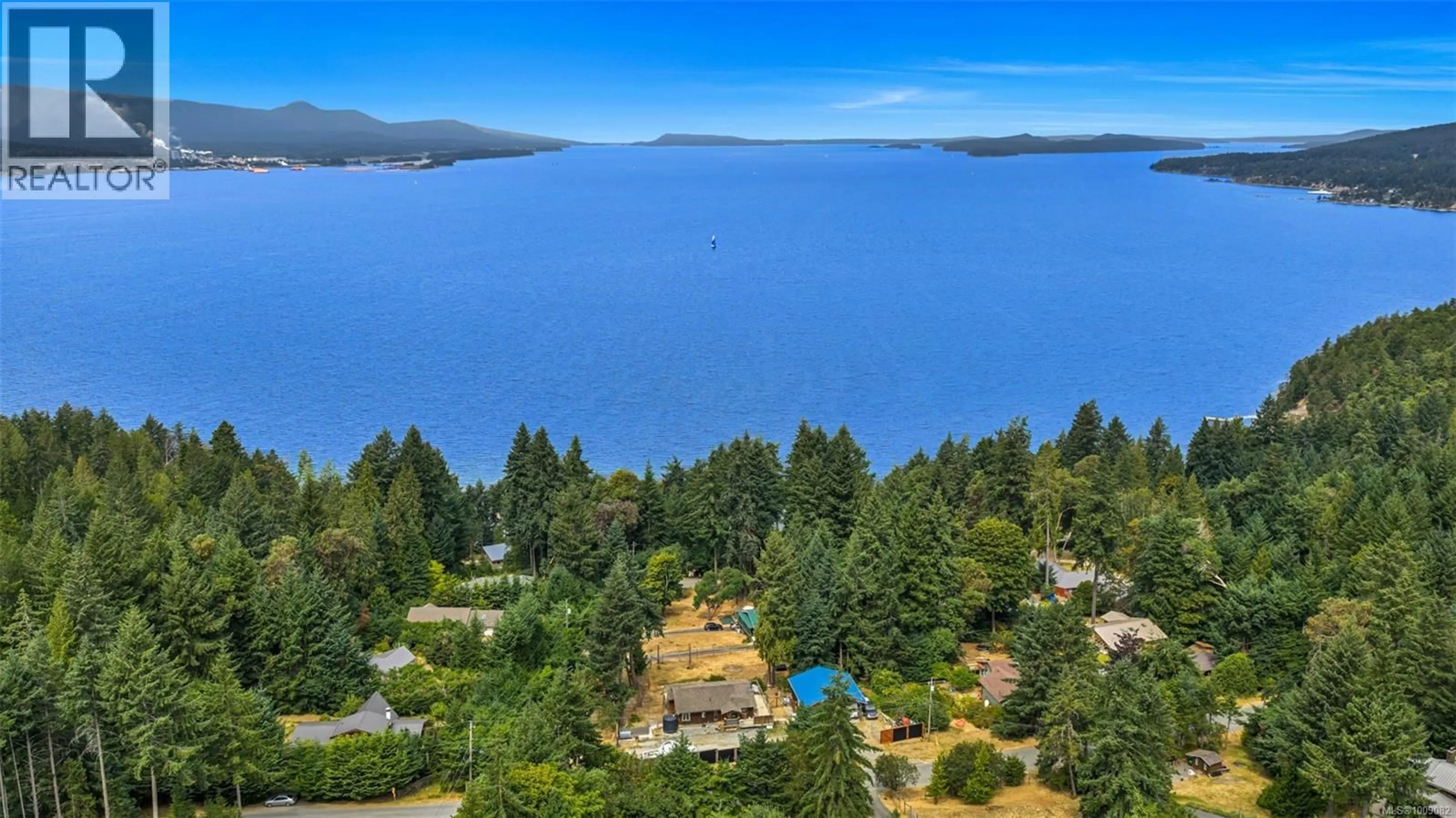 A pic from outside/outdoor area/front of a property/back of a property/a pic from drone, water/lake/river/ocean view for 386 COLLINS ROAD, Salt Spring British Columbia V8K2N1