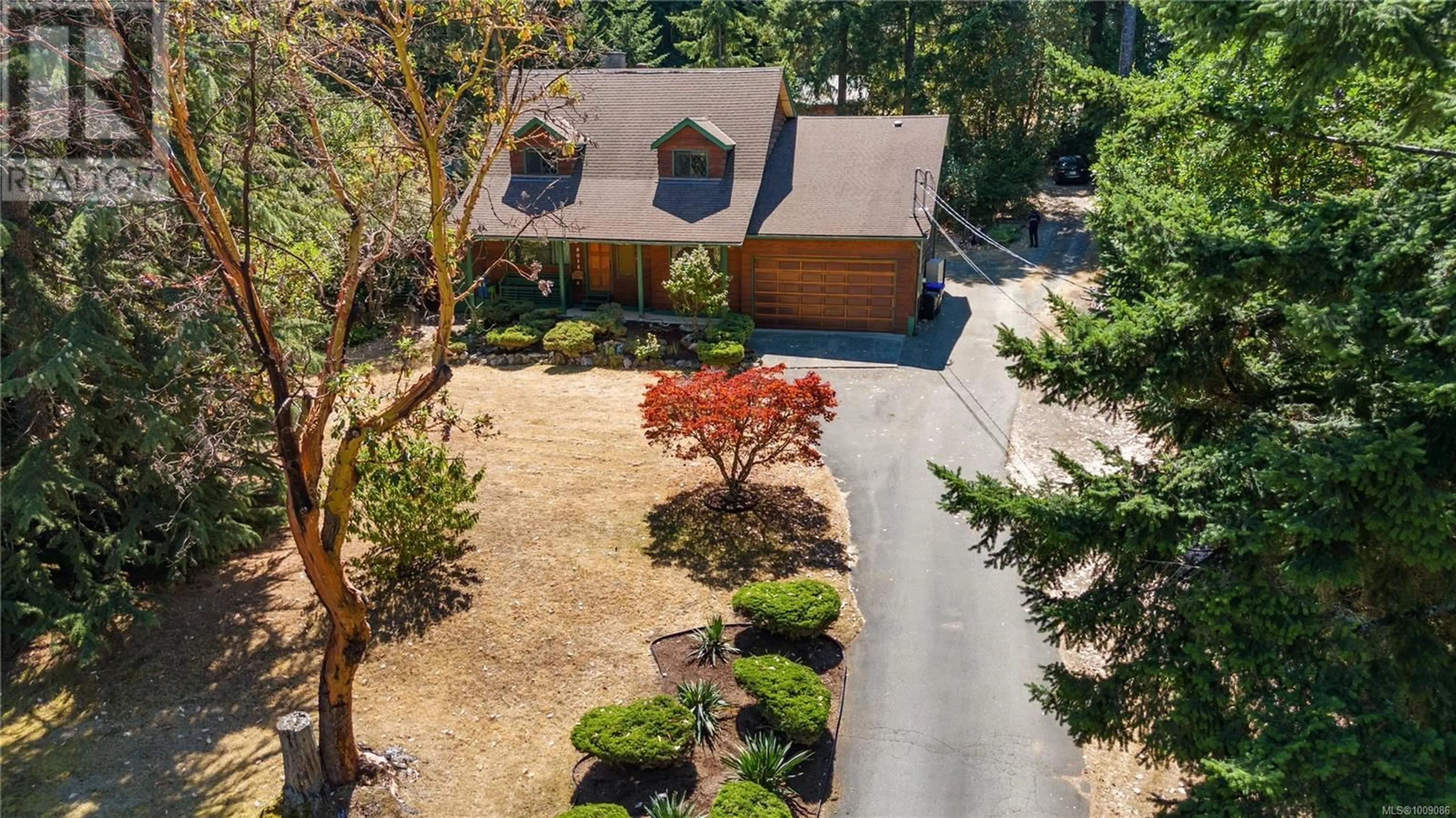 A pic from outside/outdoor area/front of a property/back of a property/a pic from drone, street for 8015 NORTHWIND DRIVE, Lantzville British Columbia V0R2H0