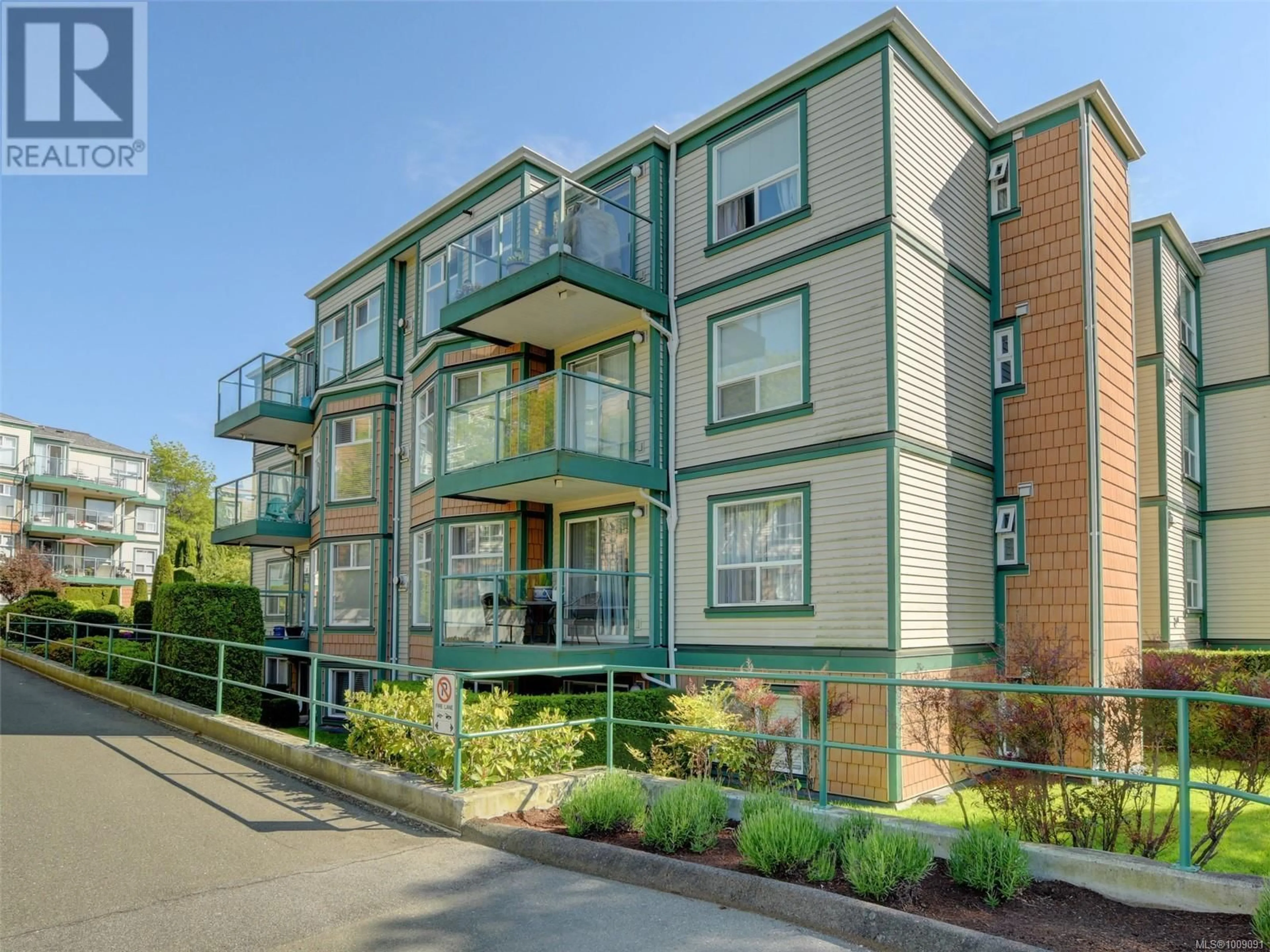 A pic from outside/outdoor area/front of a property/back of a property/a pic from drone, unknown for 210 - 894 VERNON AVENUE, Saanich British Columbia V8X2W6