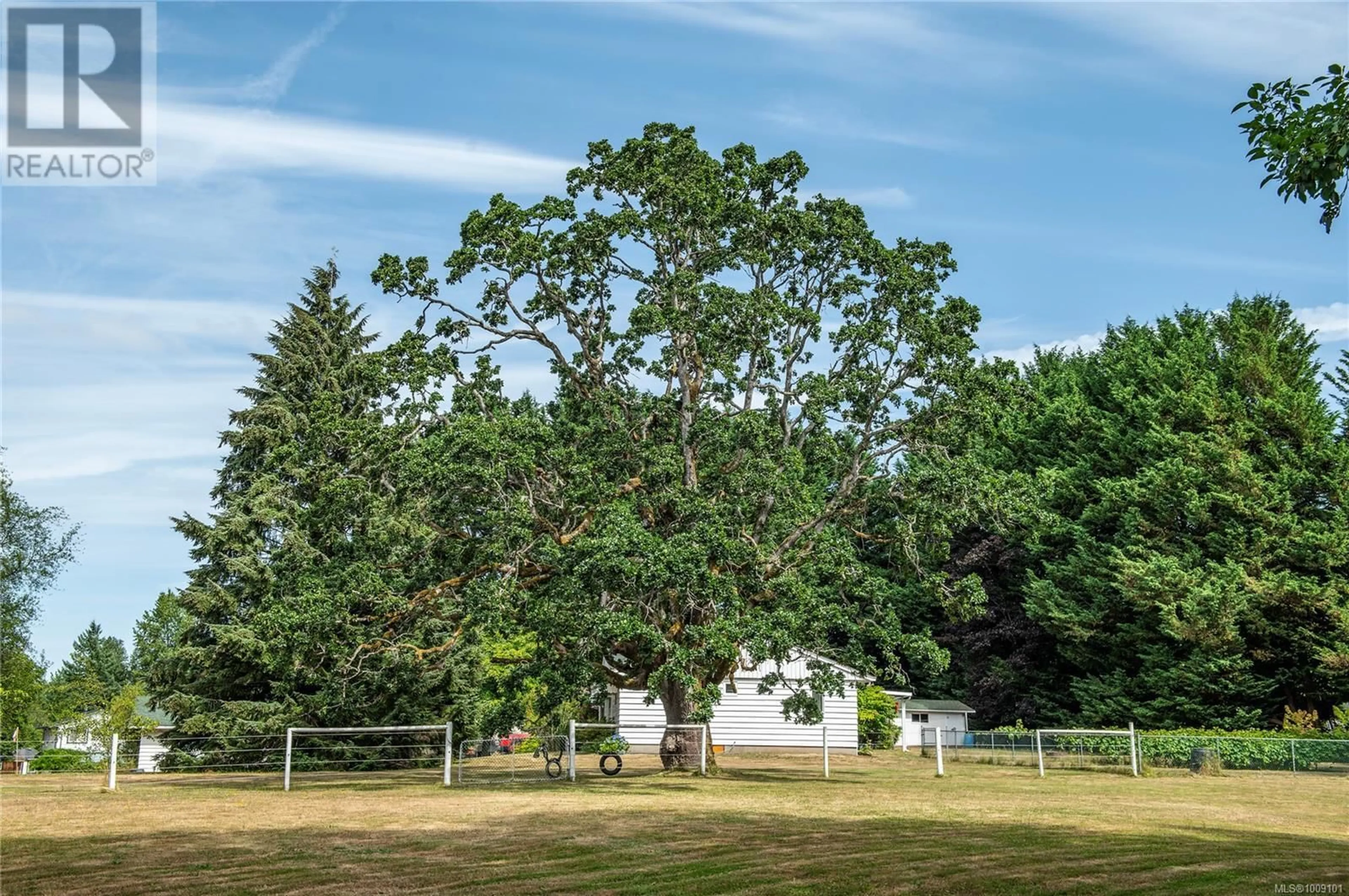 A pic from outside/outdoor area/front of a property/back of a property/a pic from drone, forest/trees view for 2671 HUBAND ROAD, Courtenay British Columbia V9J1L4