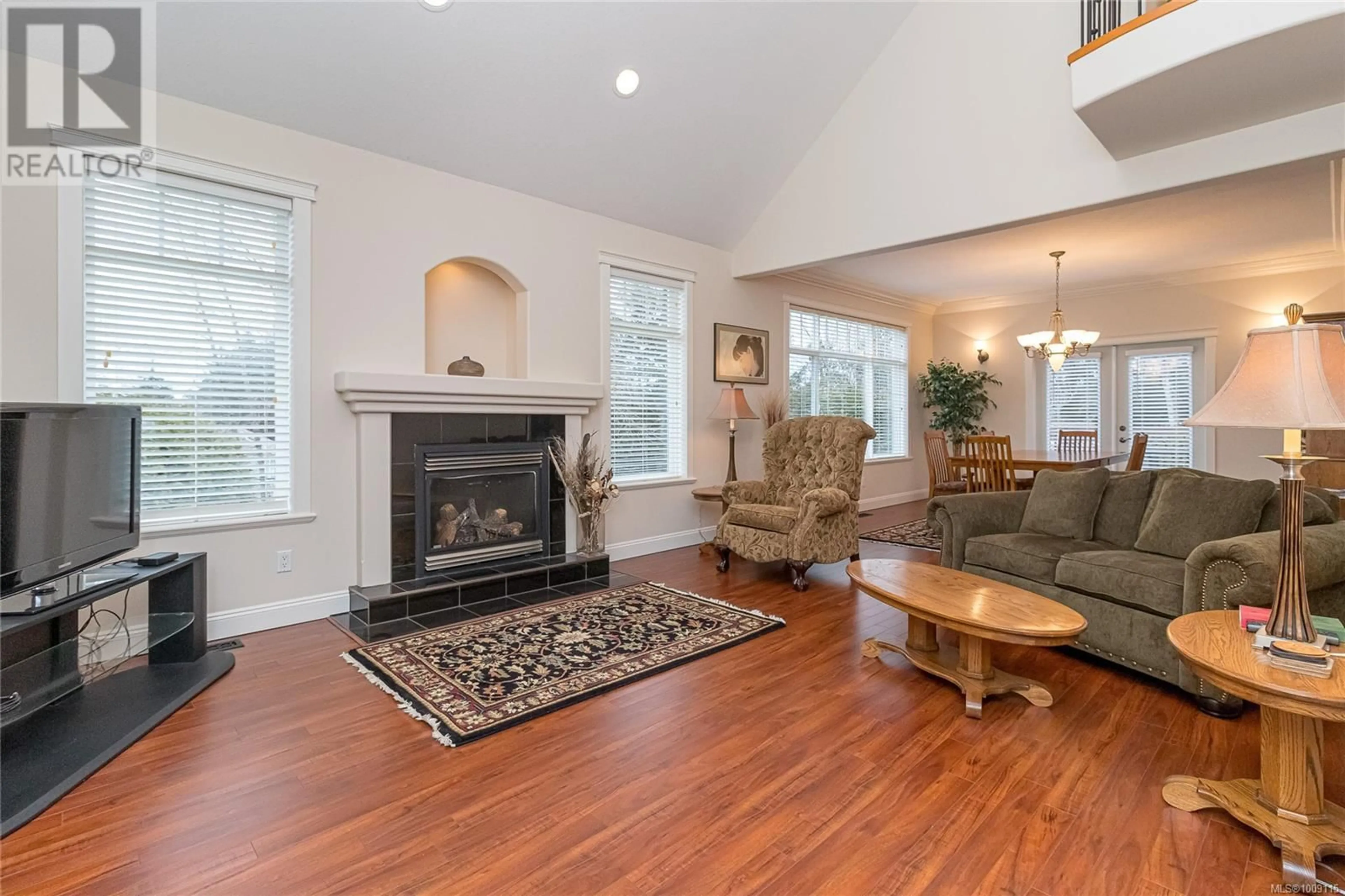 Living room with furniture, wood/laminate floor for 2559 MYLES LAKE ROAD, Nanaimo British Columbia V9X1E7