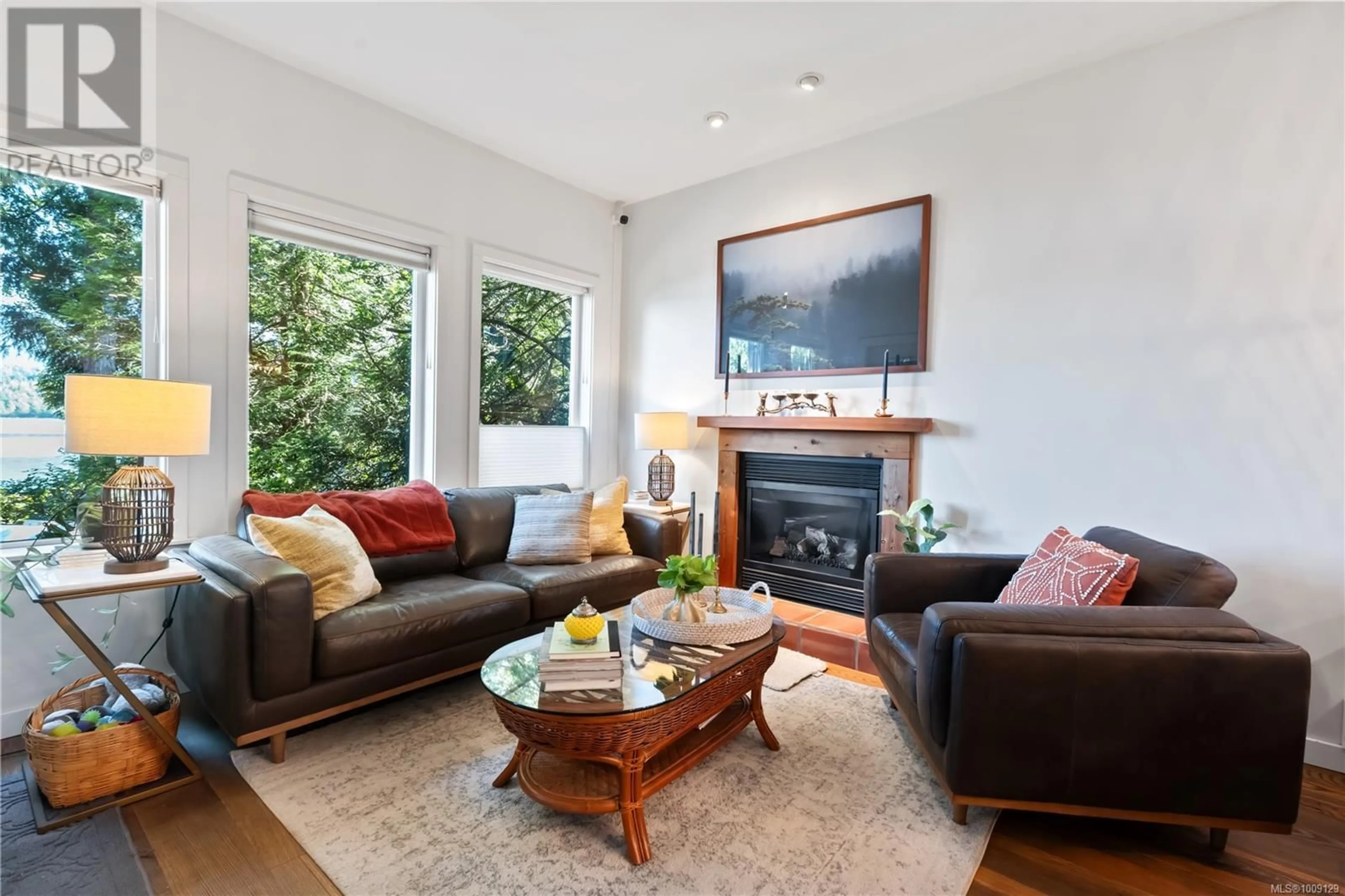 Living room with furniture, wood/laminate floor for 208 - 1971 HARBOUR DRIVE, Ucluelet British Columbia V0R3A0
