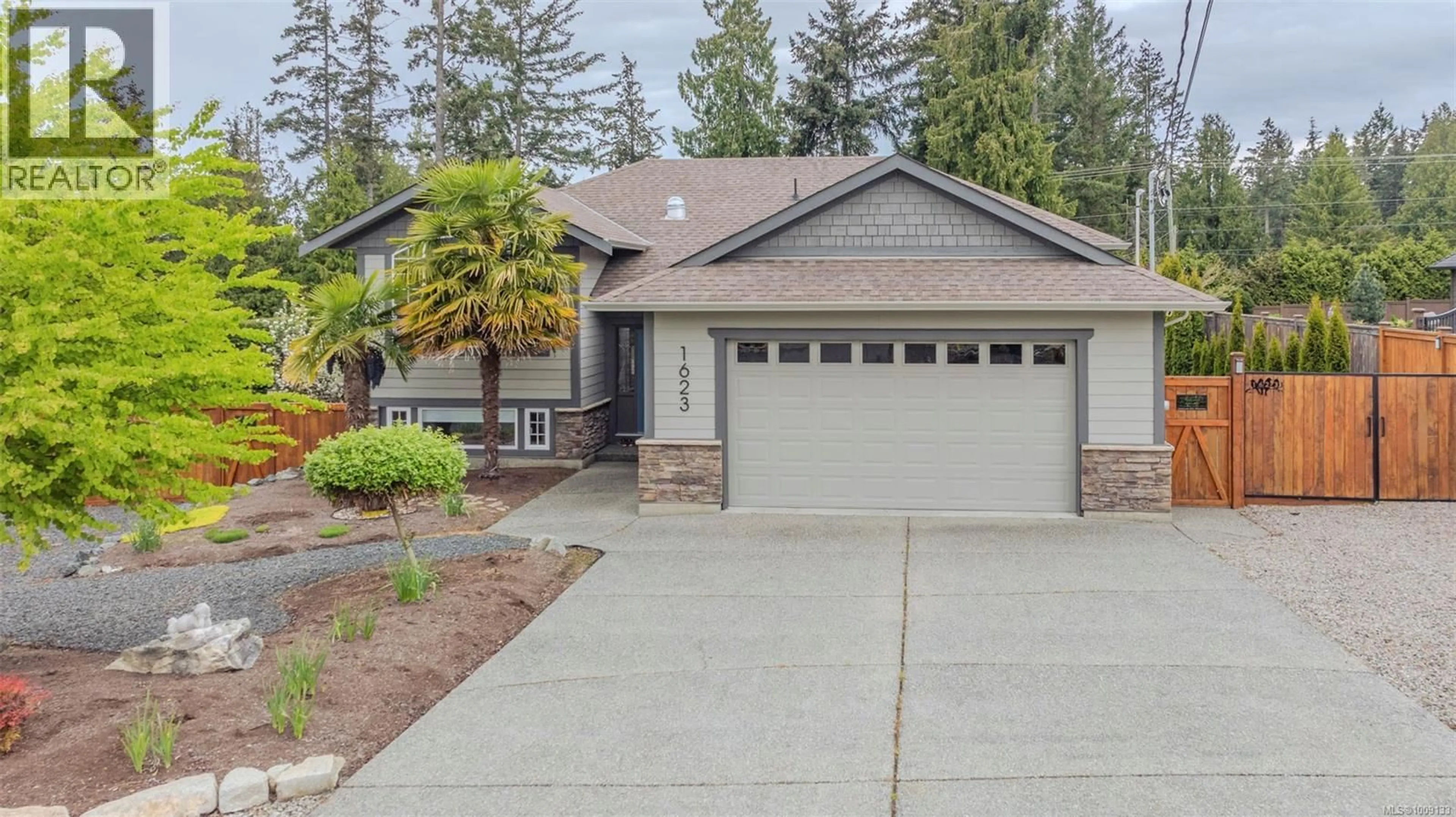 Home with vinyl exterior material, street for 1623 STONE LAKE DRIVE, Nanoose Bay British Columbia V9P9L1